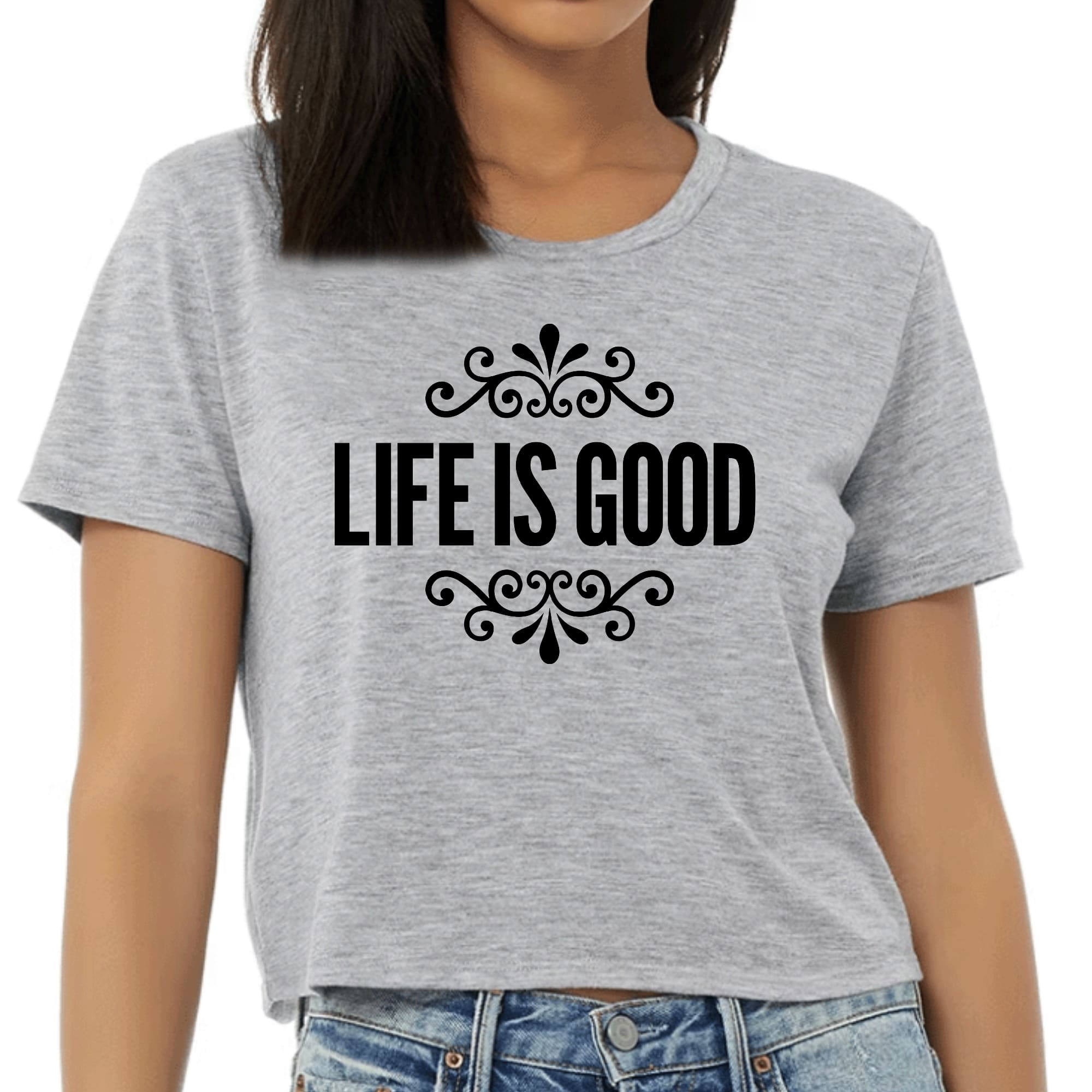Womens Cropped Graphic T-shirt featuring Life is Good word art illustration in black, made from soft preshrunk cotton.
