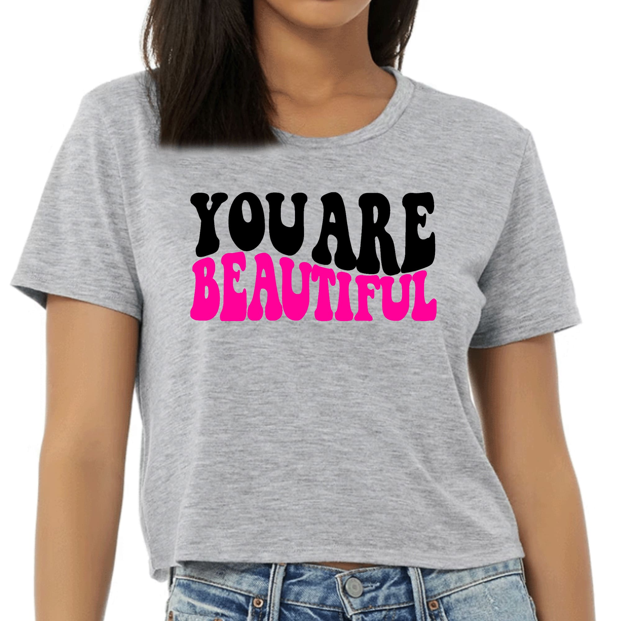 Women's Cropped Graphic T-shirt featuring 'You are Beautiful' print in retro wavy design, perfect for casual wear.