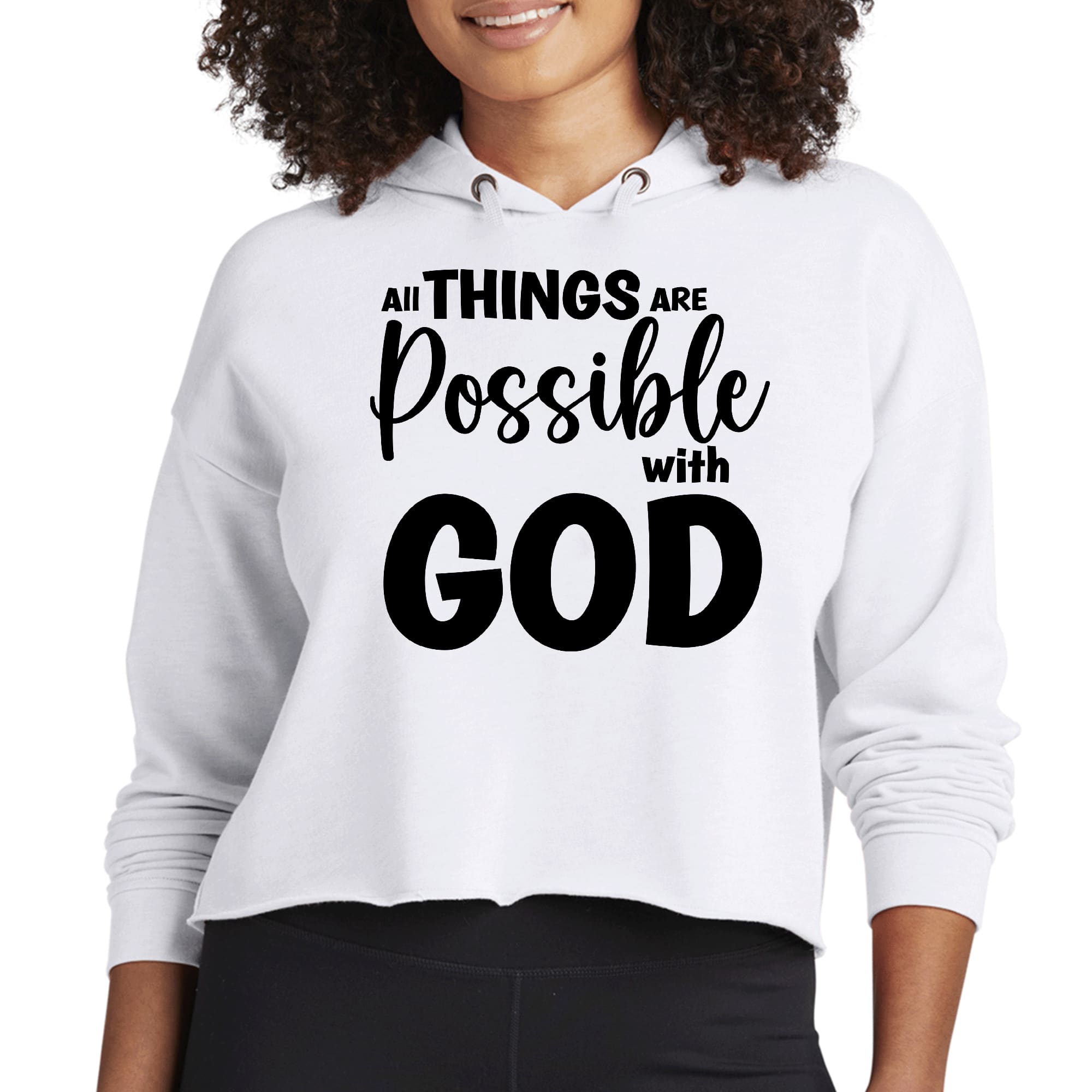 Women's black cropped hoodie featuring the phrase 'All Things are Possible with God', showcasing a relaxed fit and stylish design.