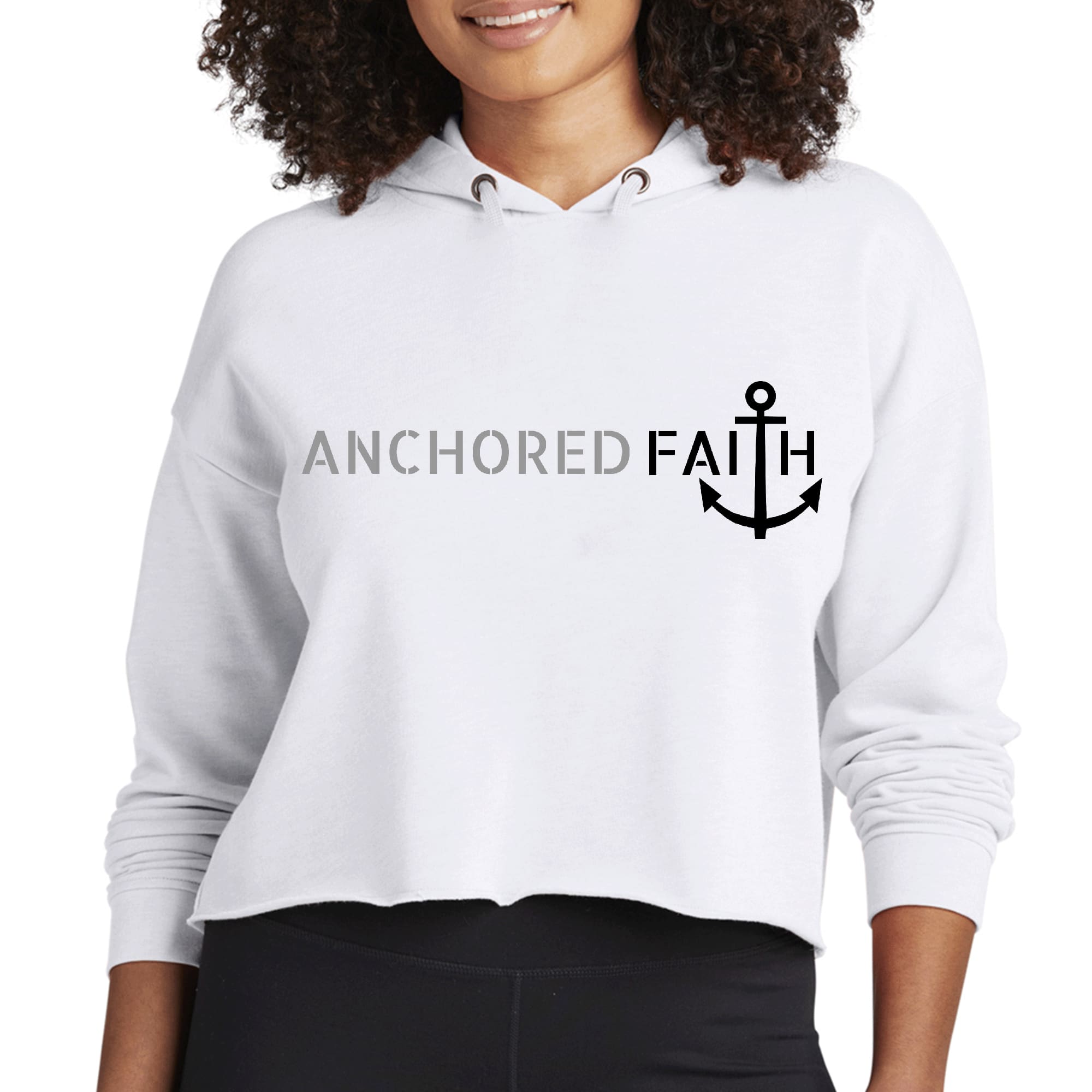 Women's cropped hoodie in grey and black with Anchored Faith print, featuring a double fabric hood and raw edge hem.