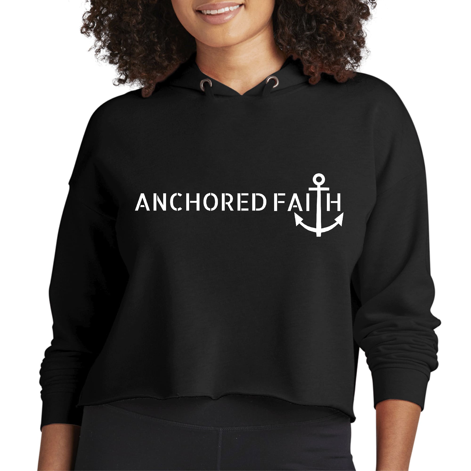 Women's cropped hoodie featuring Anchored Faith print, showcasing a stylish design with a relaxed fit and soft fabric.