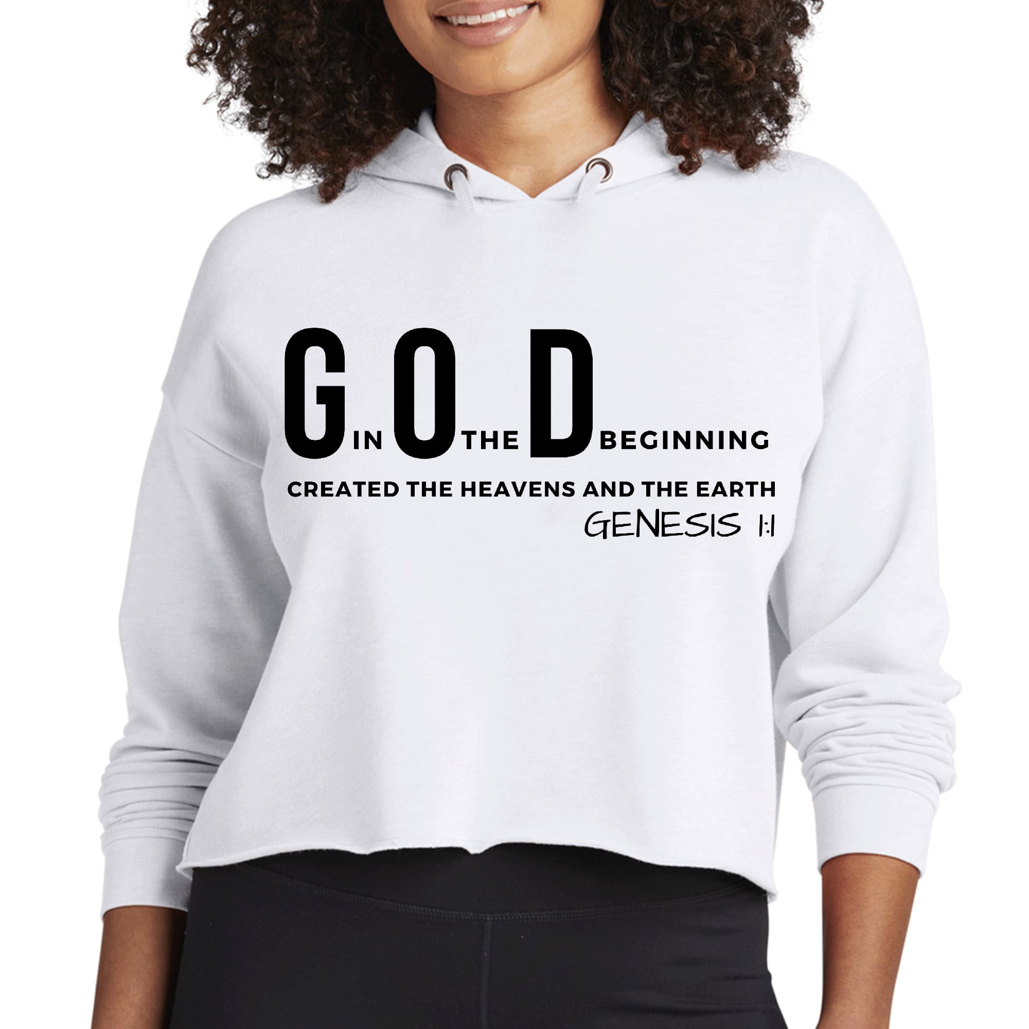 Women's cropped hoodie in black featuring 'God in the Beginning' scripture print, showcasing a relaxed fit and soft fabric.