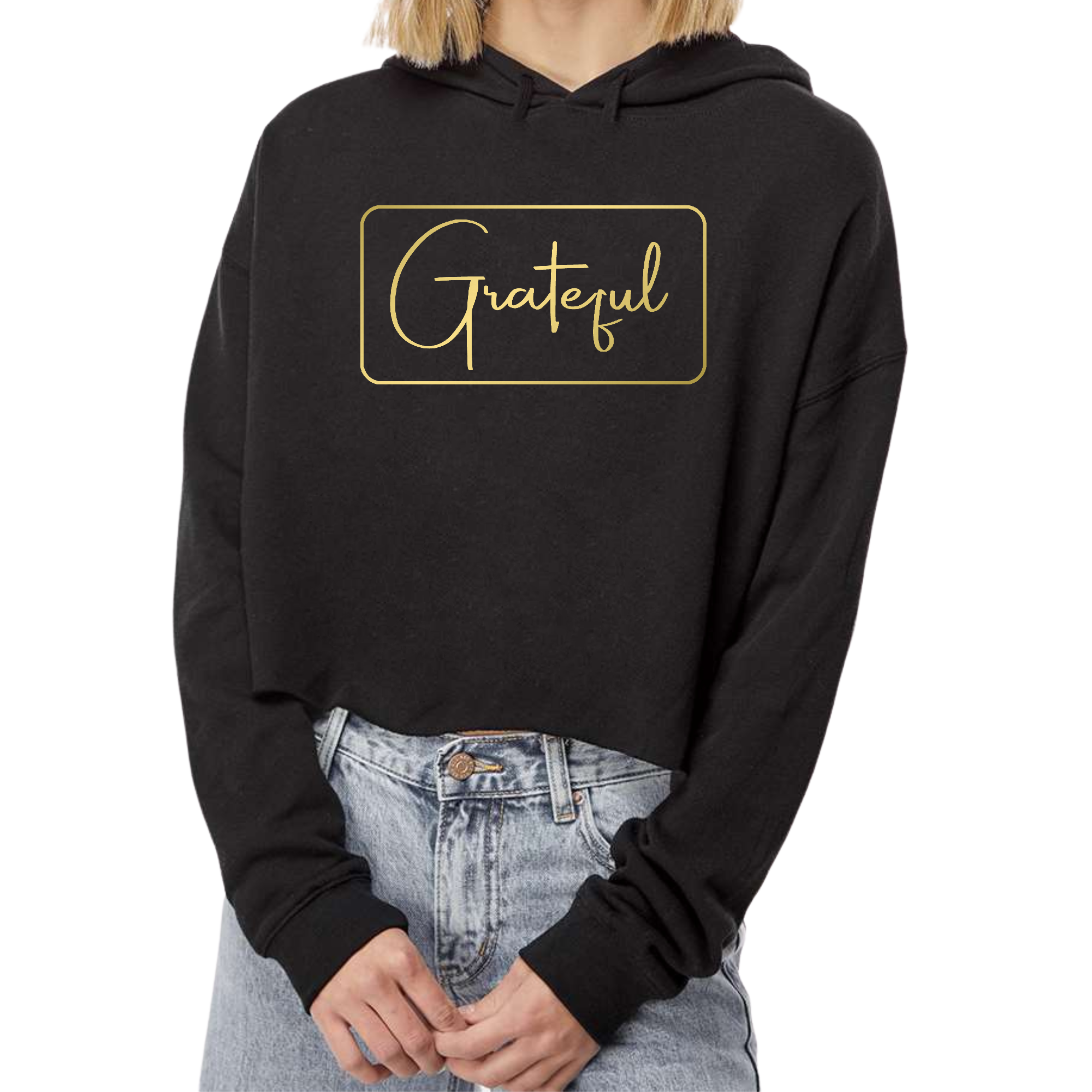 Women's cropped hoodie featuring a metallic gold 'Grateful' illustration, showcasing a relaxed fit and stylish design.