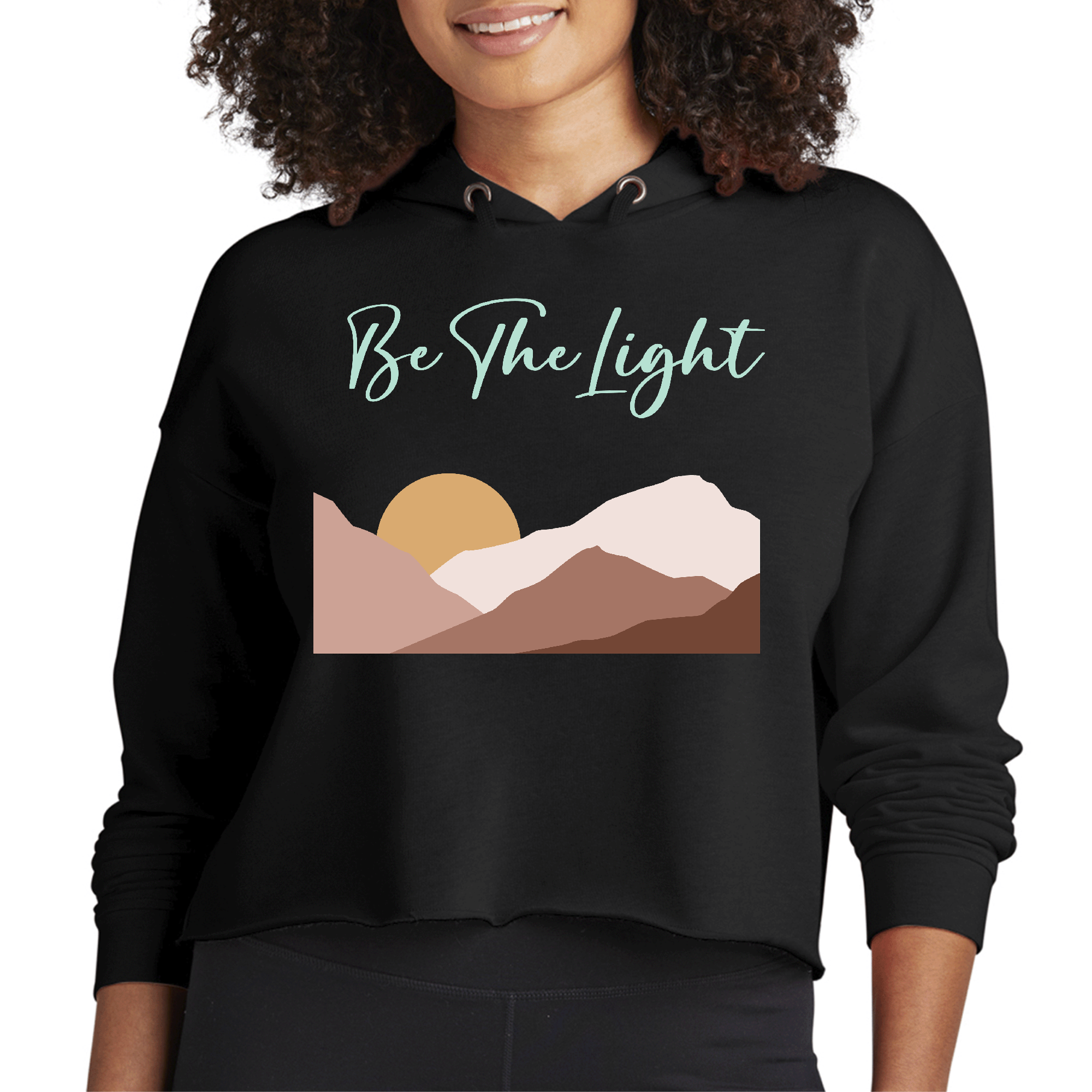 Womens Cropped Hoodie featuring 'Say it Soul, be the Light' illustration, showcasing a trendy design with a drawstring hood and ribbed cuffs.
