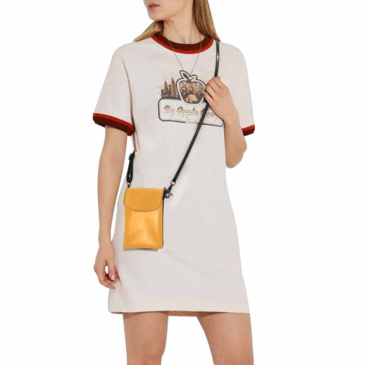 Stylish yellow orange womens crossbody bag made of PU leather with adjustable strap and zippered pockets.