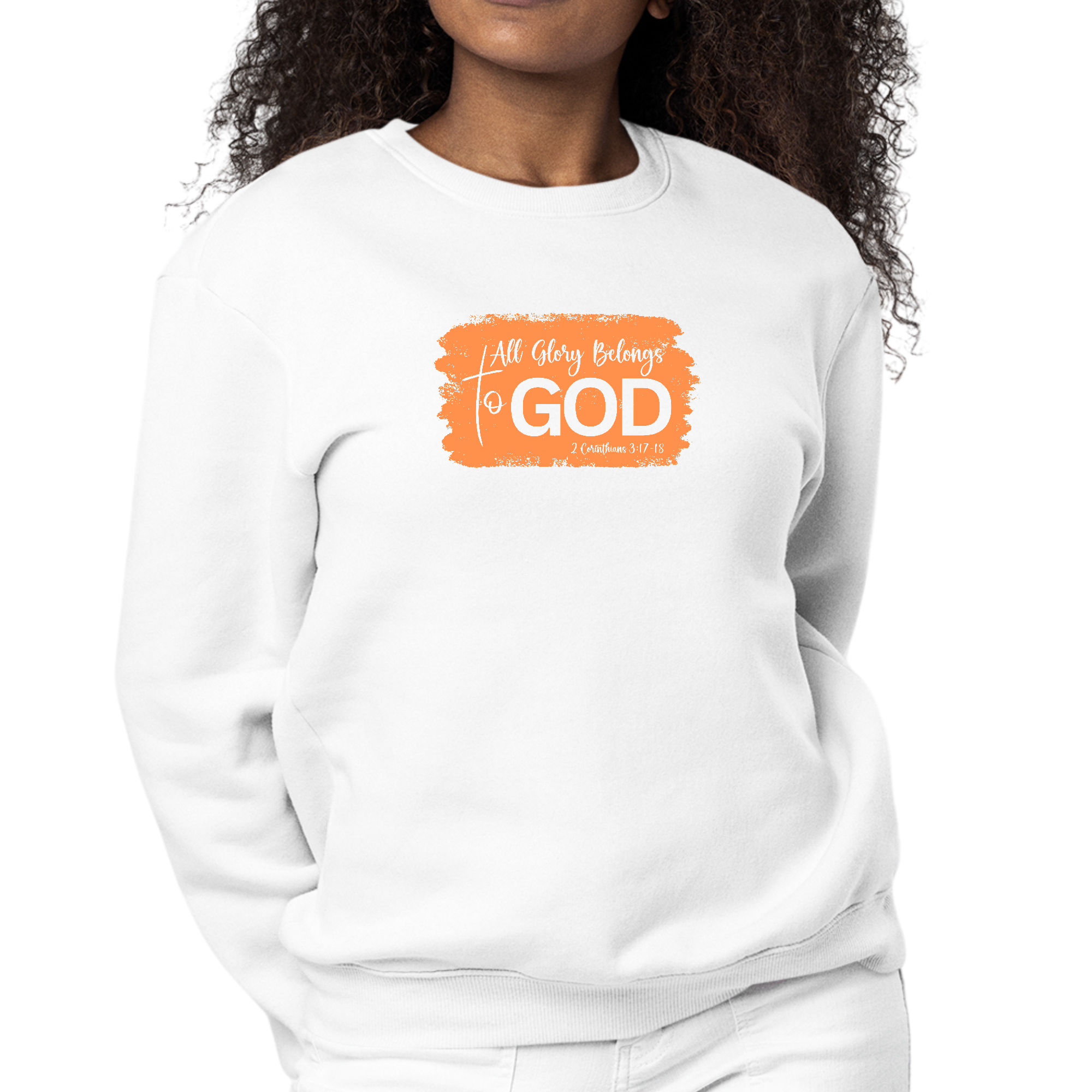 Womens Graphic Sweatshirt in orange with 'All Glory Belongs to God' illustration, showcasing a cozy crewneck design.