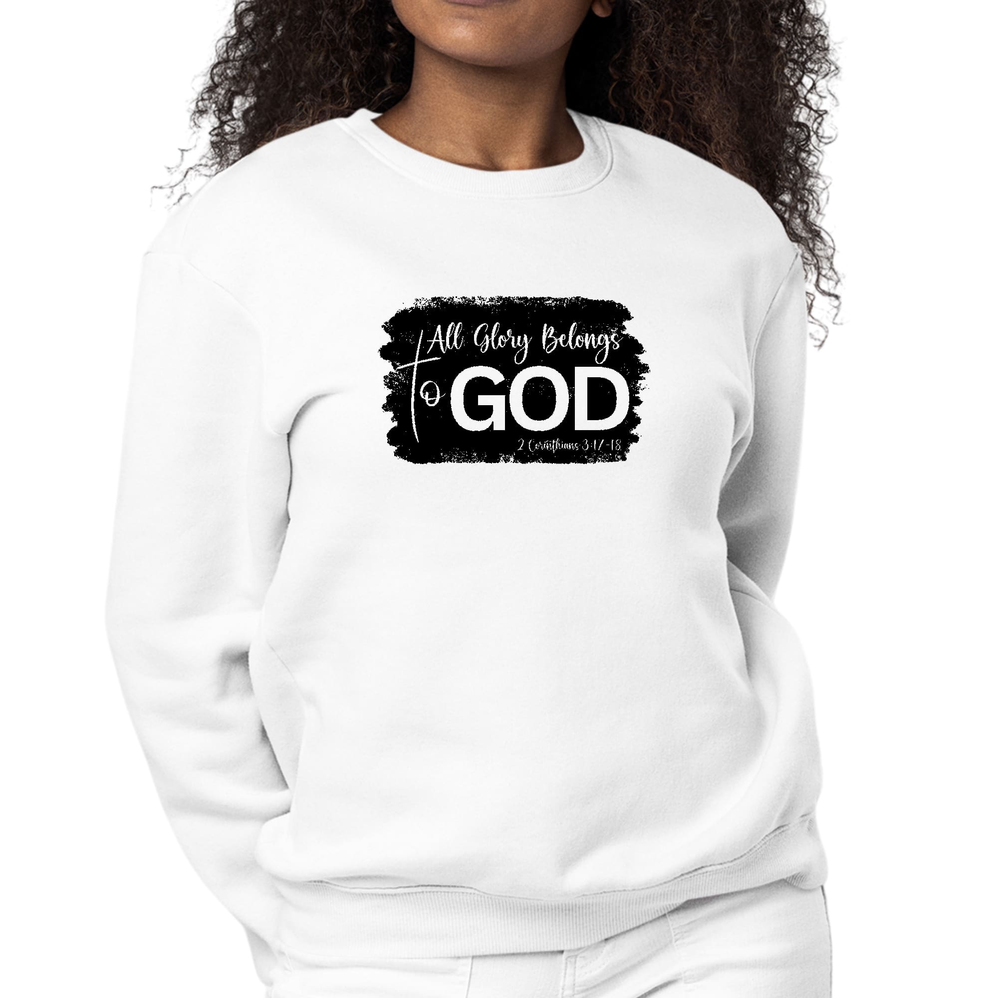 Women's black graphic sweatshirt with 'All Glory Belongs to God' print, featuring long sleeves and a crewneck design.