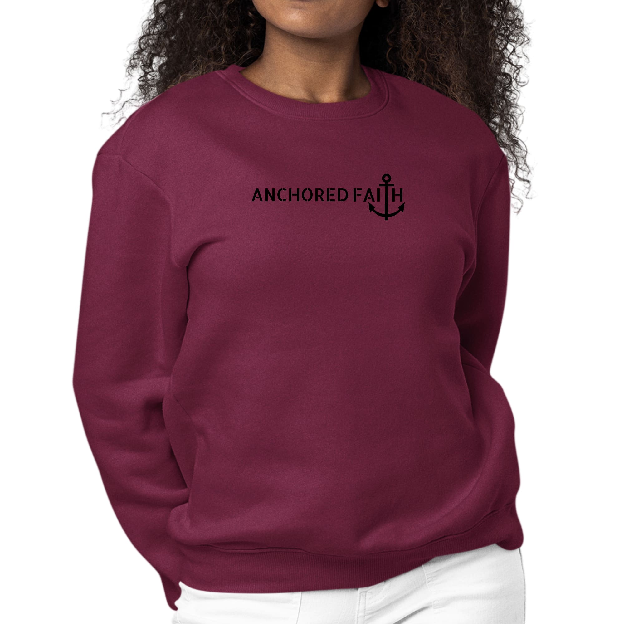 Women's Graphic Sweatshirt in black featuring Anchored Faith design, showcasing long sleeves and ribbed details.