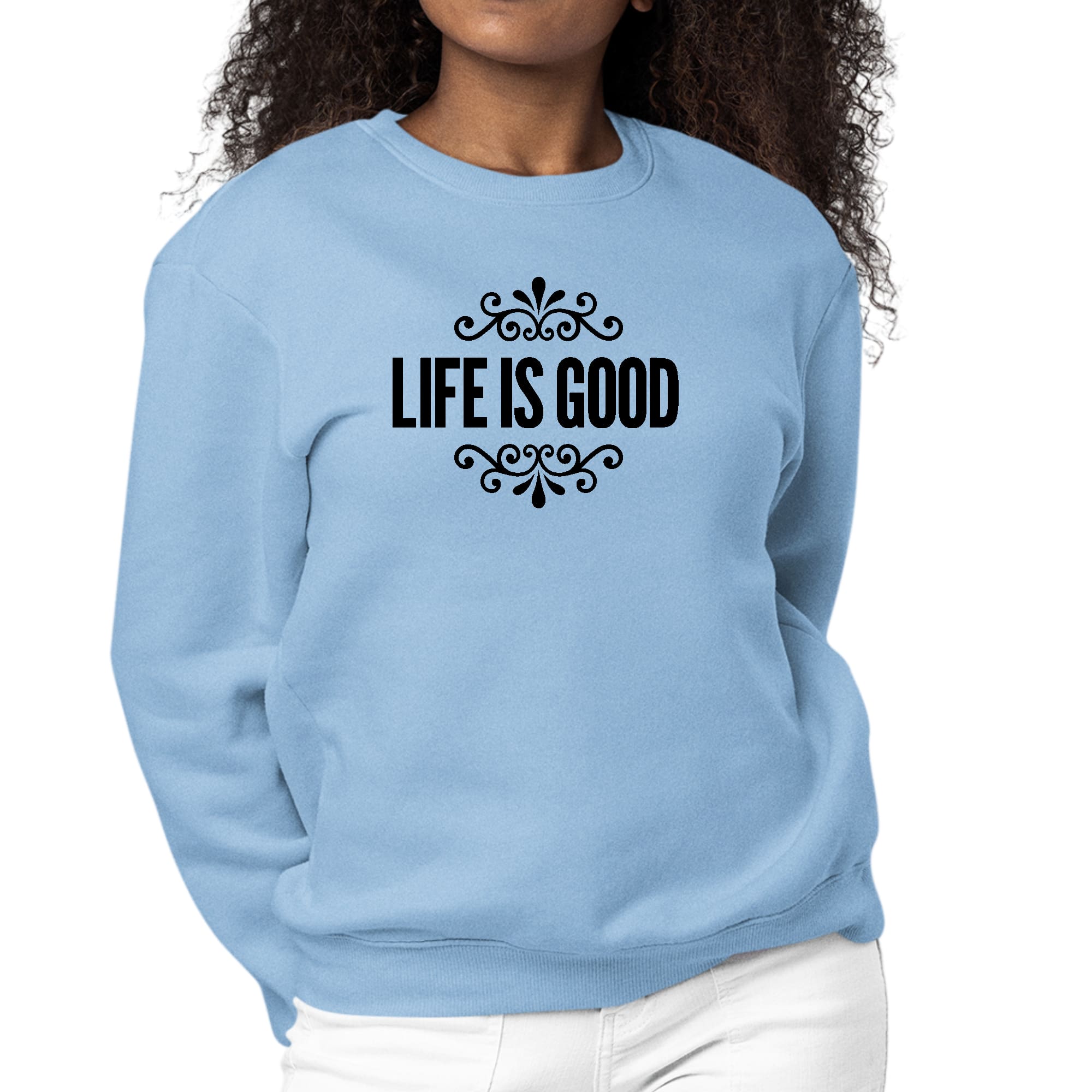 Women's black graphic sweatshirt with 'Life is Good' word art illustration, featuring long sleeves and a comfortable crewneck design.