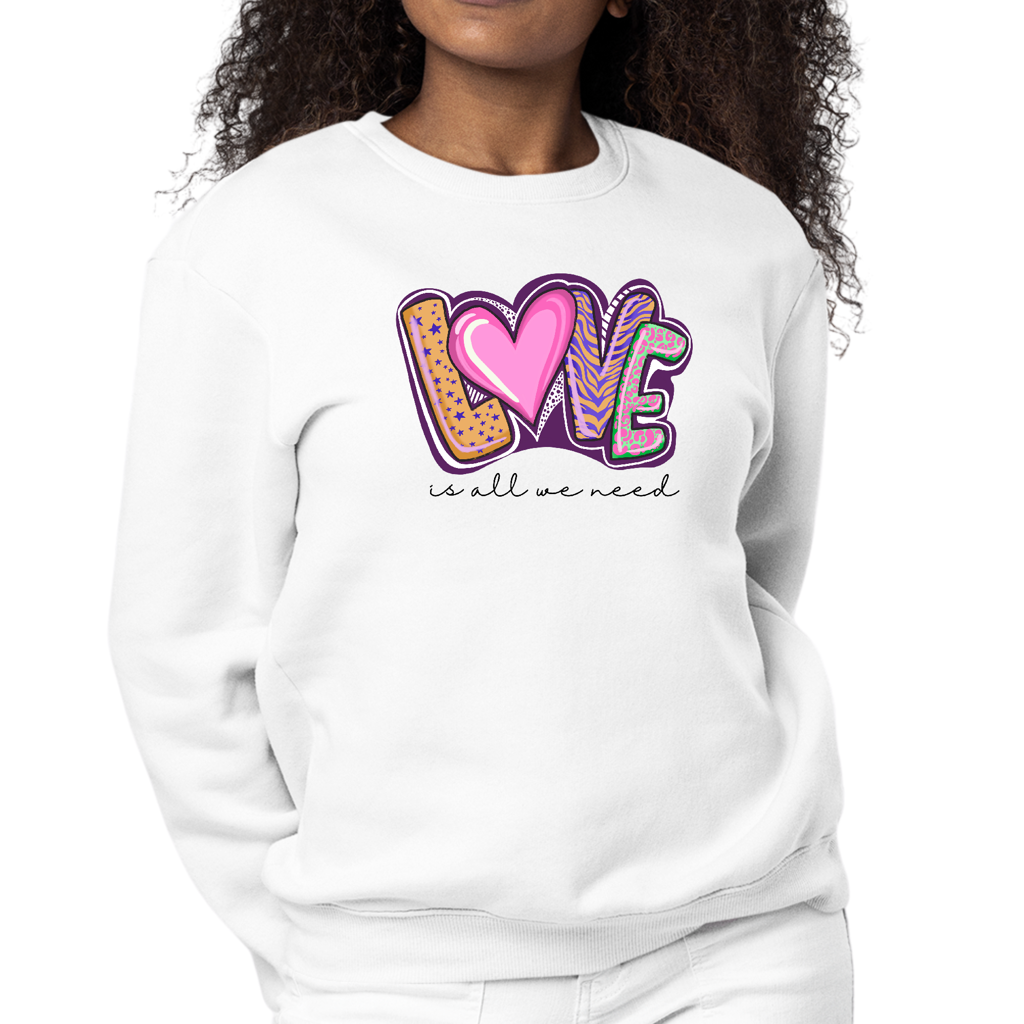 Women's Graphic Sweatshirt featuring 'Love is All We Need' design, showcasing a soft fabric and unisex fit.