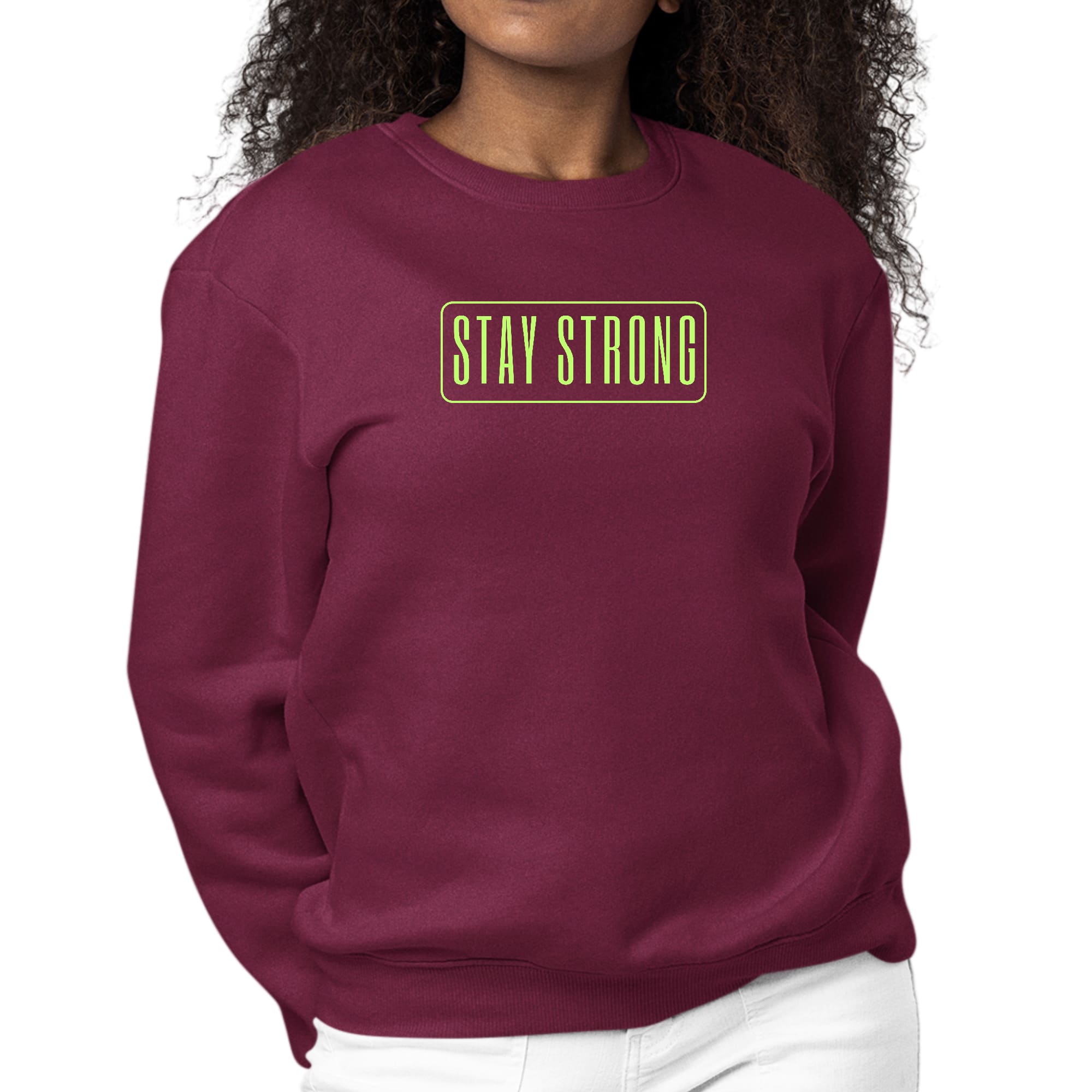 Women's long sleeve crewneck sweatshirt with neon 'Stay Strong' graphic print, showcasing vibrant colors and comfortable fit.