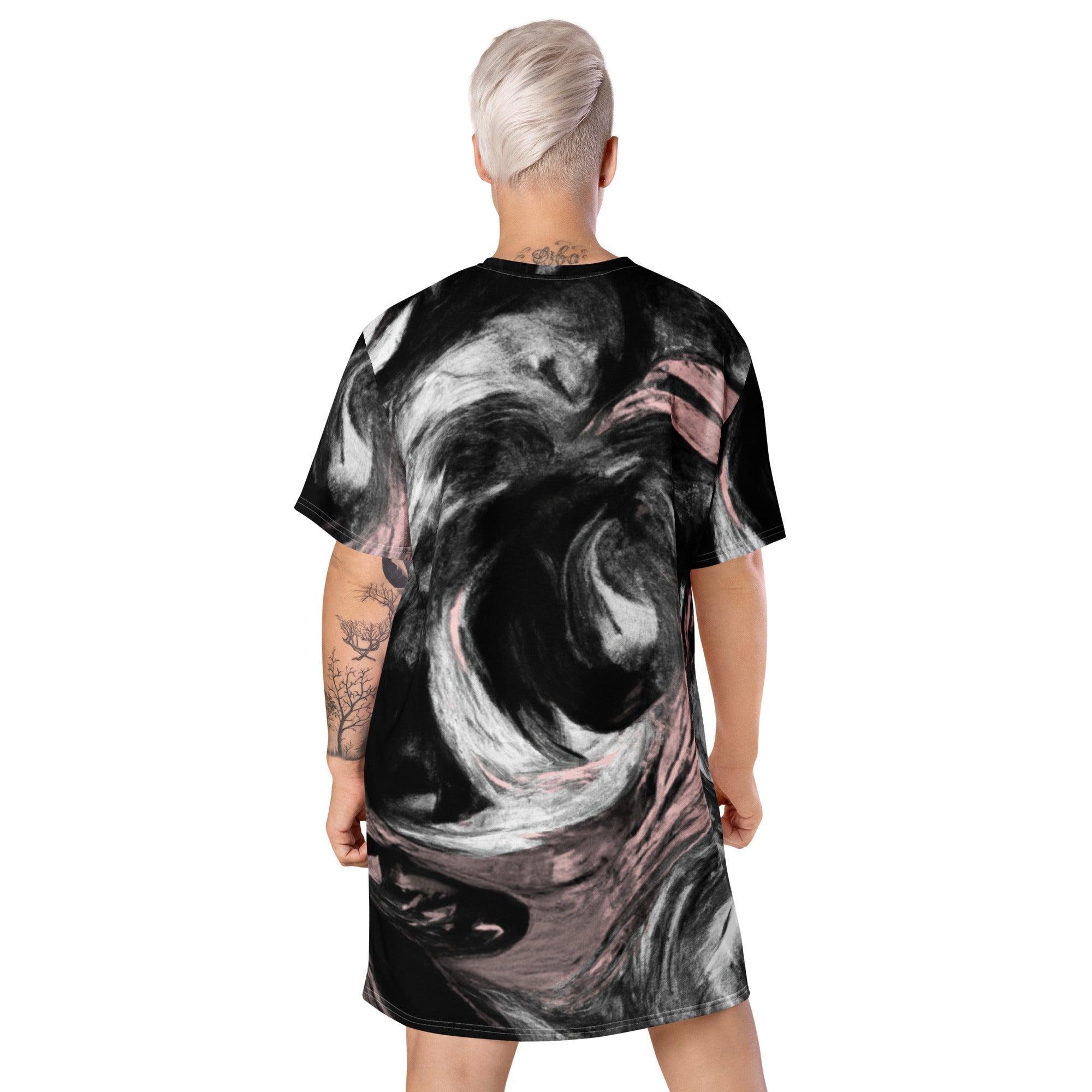 Womens Graphic T-shirt Dress featuring a black, pink, and white abstract pattern, showcasing its oversized fit and stylish design.