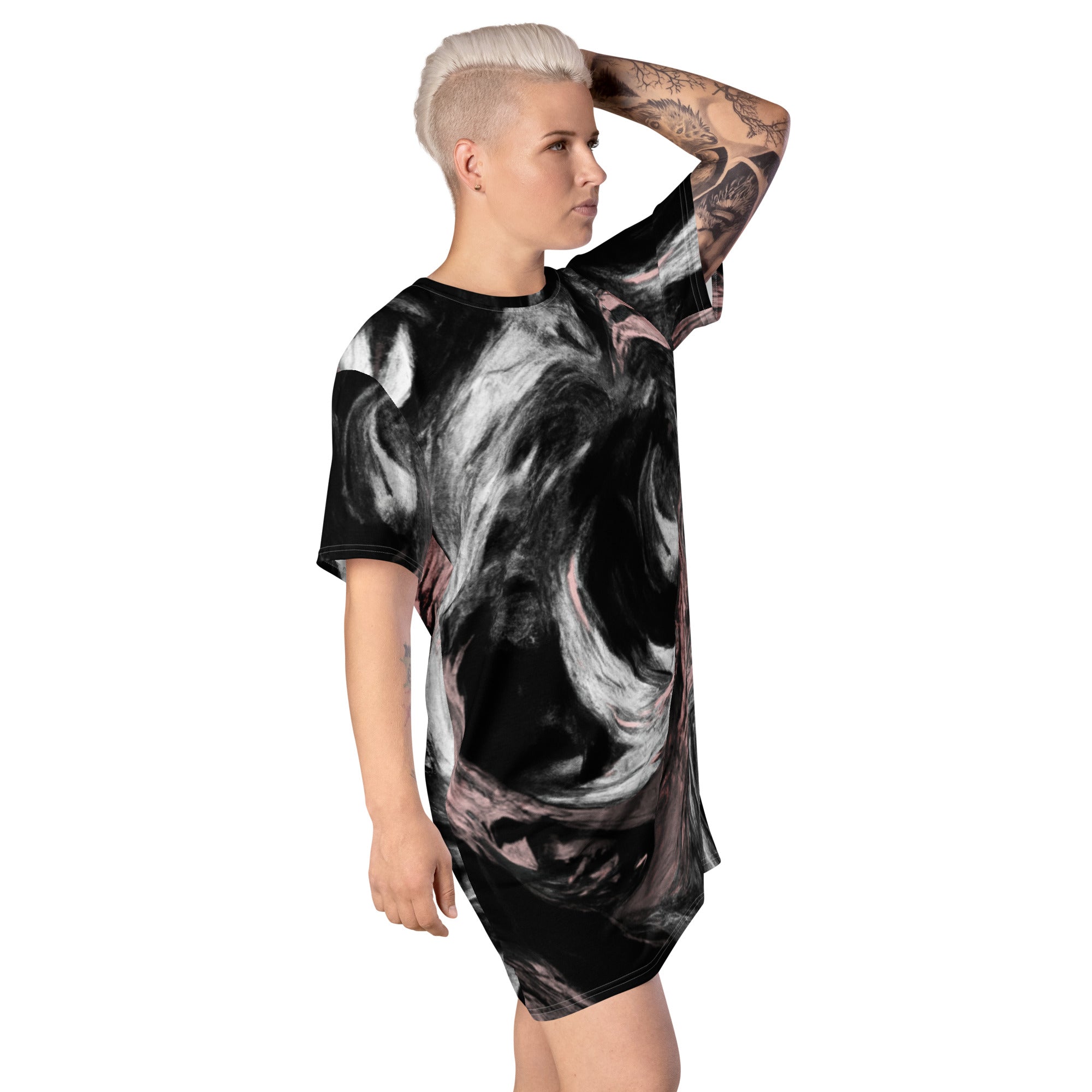 Womens Graphic T-shirt Dress featuring a black, pink, and white abstract pattern, showcasing its oversized fit and stylish design.