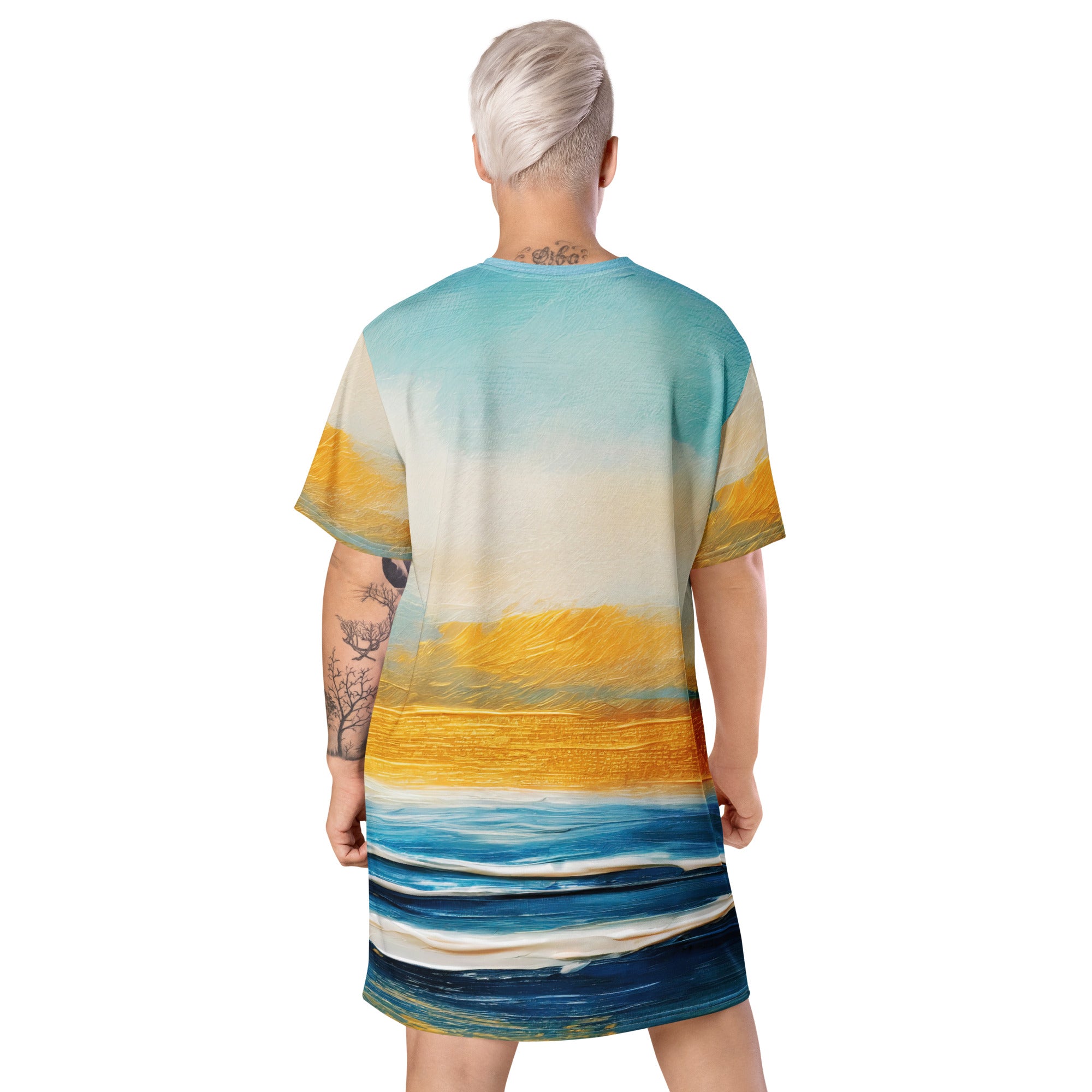 Womens Graphic T-shirt Dress featuring a Blue Ocean Golden Sunset print, showcasing its oversized fit and stylish design.
