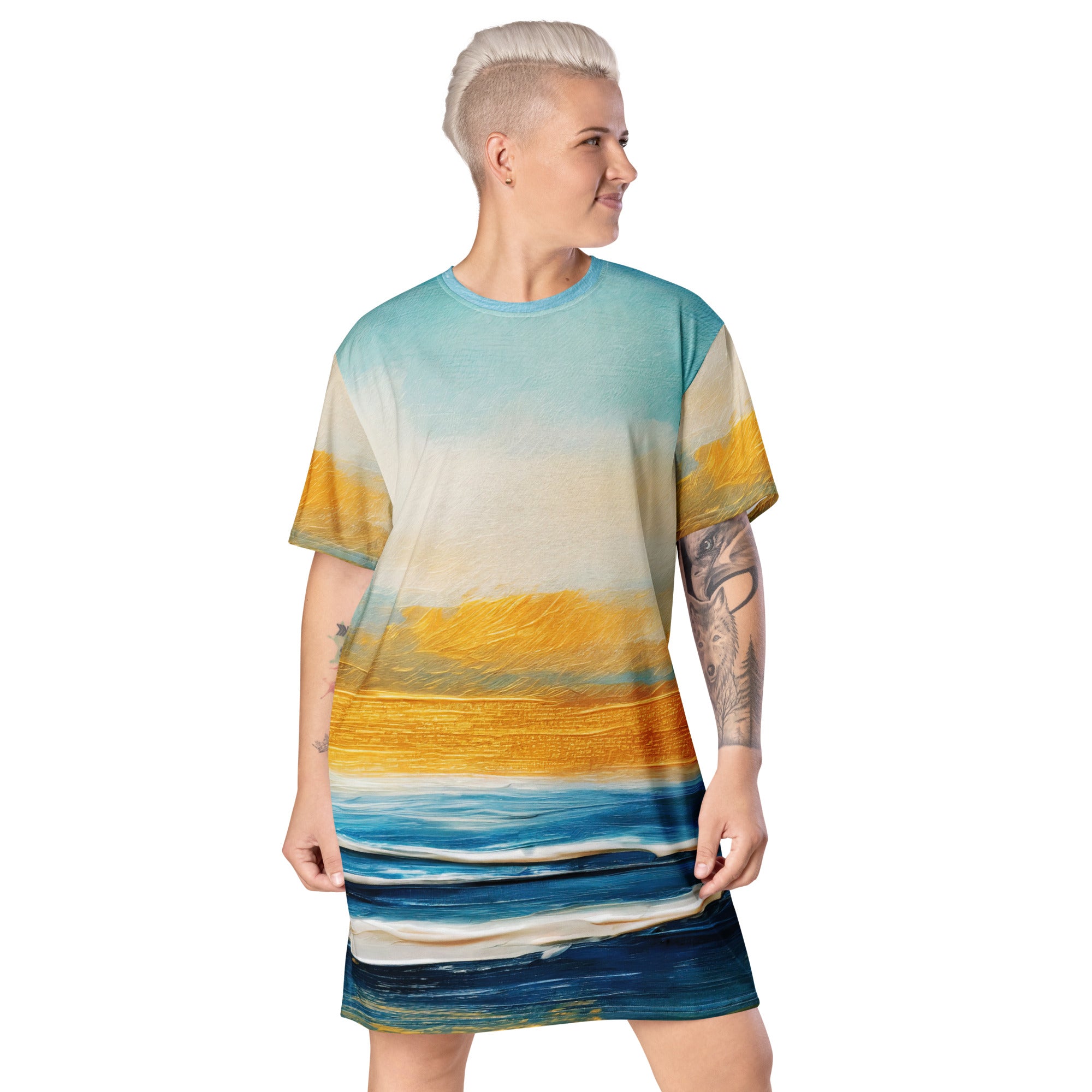 Womens Graphic T-shirt Dress featuring a Blue Ocean Golden Sunset print, showcasing its oversized fit and stylish design.