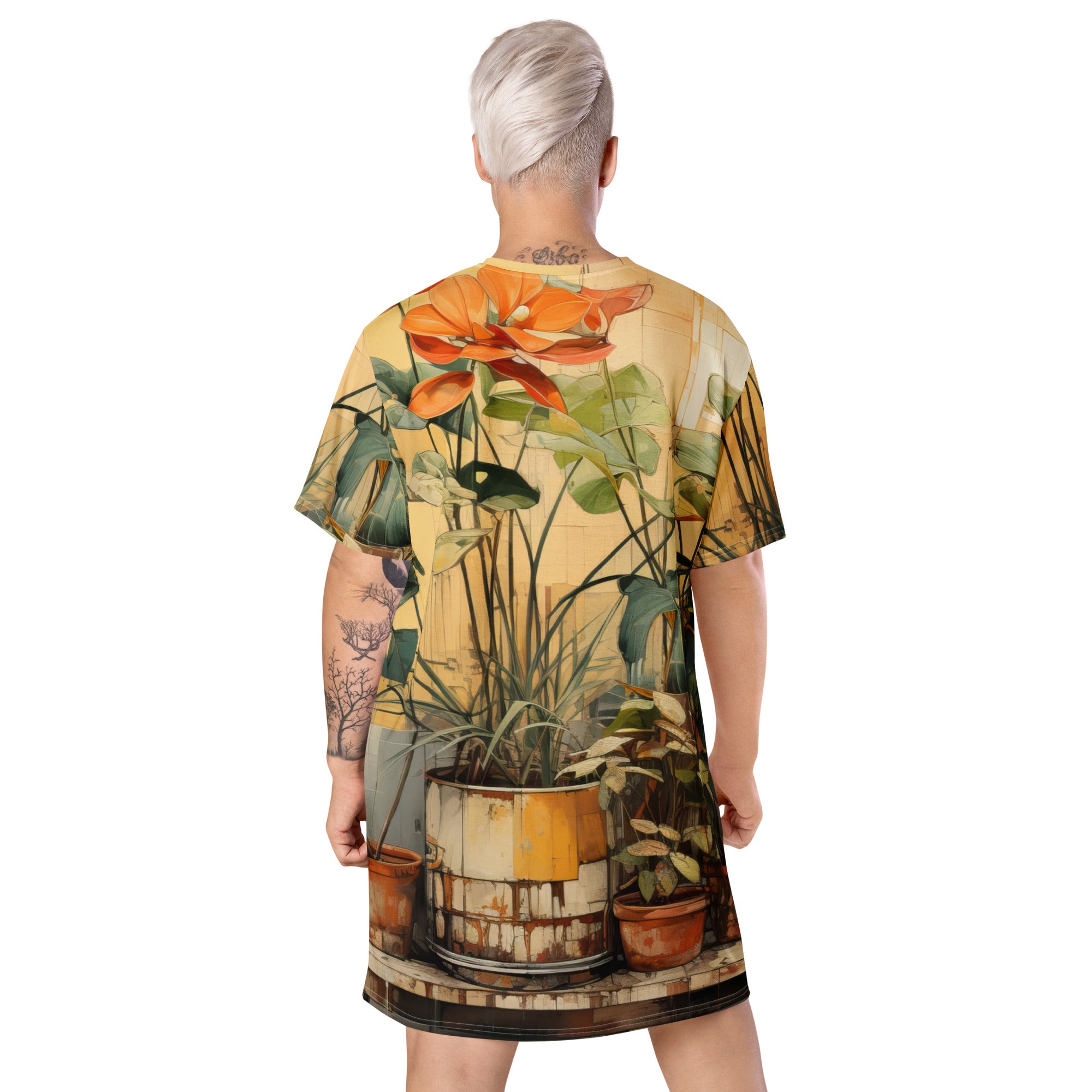 Womens Graphic T-shirt Dress featuring an earthy rustic potted plants print, showcasing its comfortable oversized fit and stylish design.