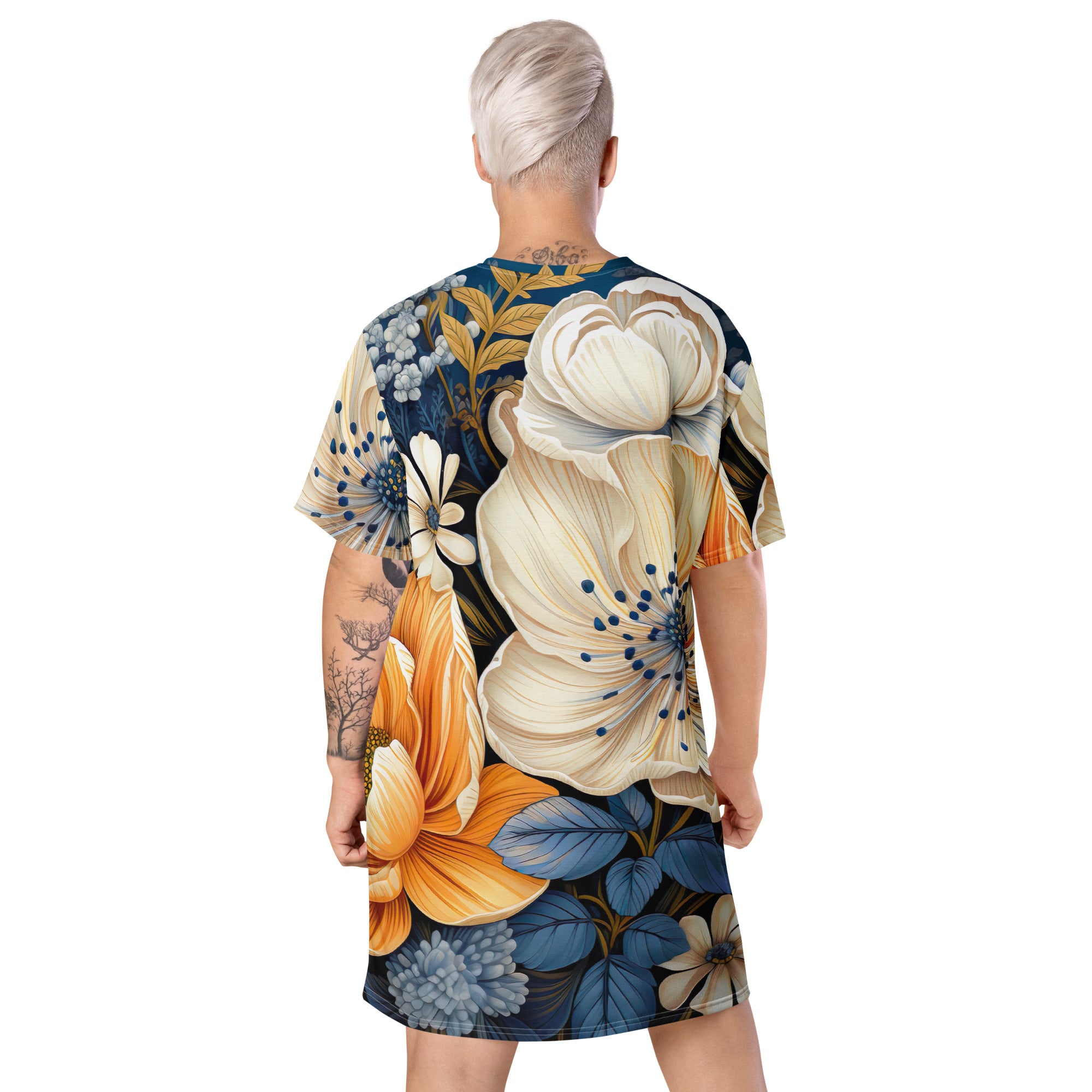 Womens Graphic T-shirt Dress featuring a vibrant floral blue print, showcasing its comfortable oversized fit and stylish design.