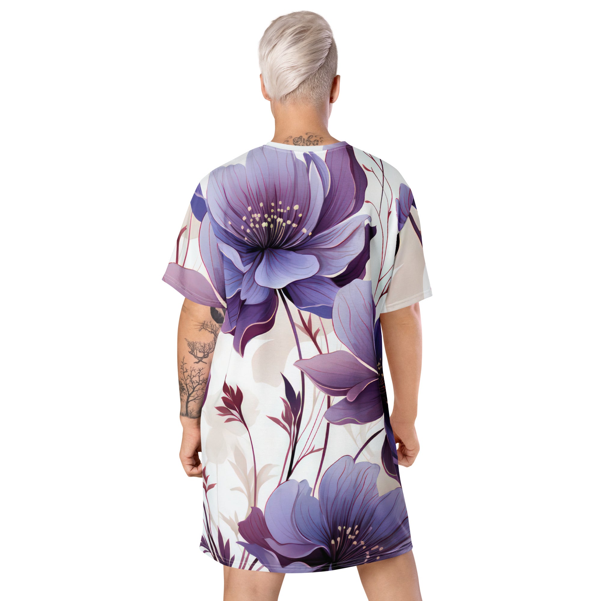 Womens Graphic T-shirt Dress featuring a vibrant purple botanical blooms design, showcasing its oversized fit and stylish look.