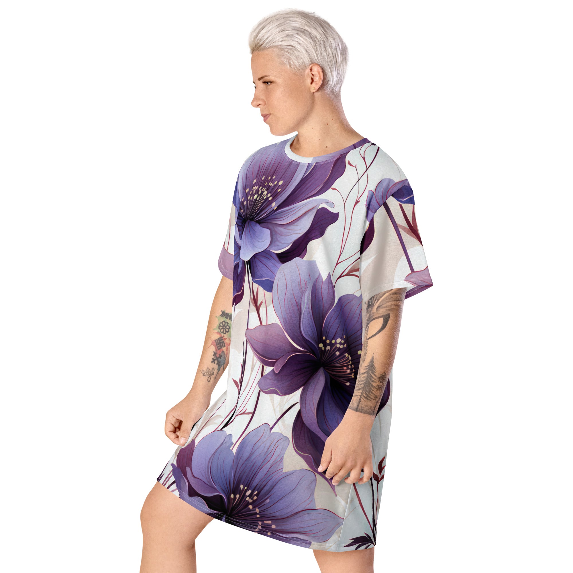 Womens Graphic T-shirt Dress featuring a vibrant purple botanical blooms design, showcasing its oversized fit and stylish look.