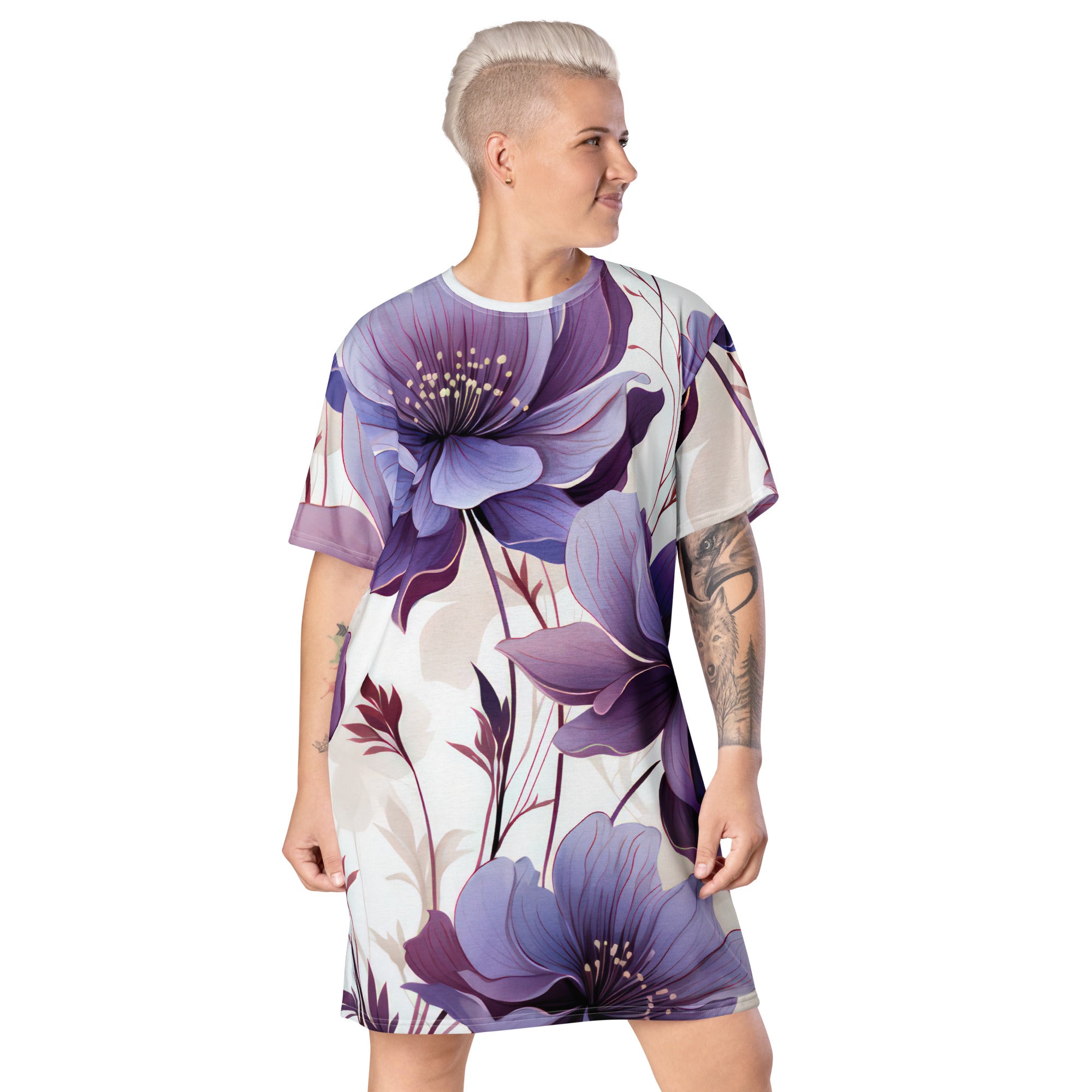 Womens Graphic T-shirt Dress featuring a vibrant purple botanical blooms design, showcasing its oversized fit and stylish look.