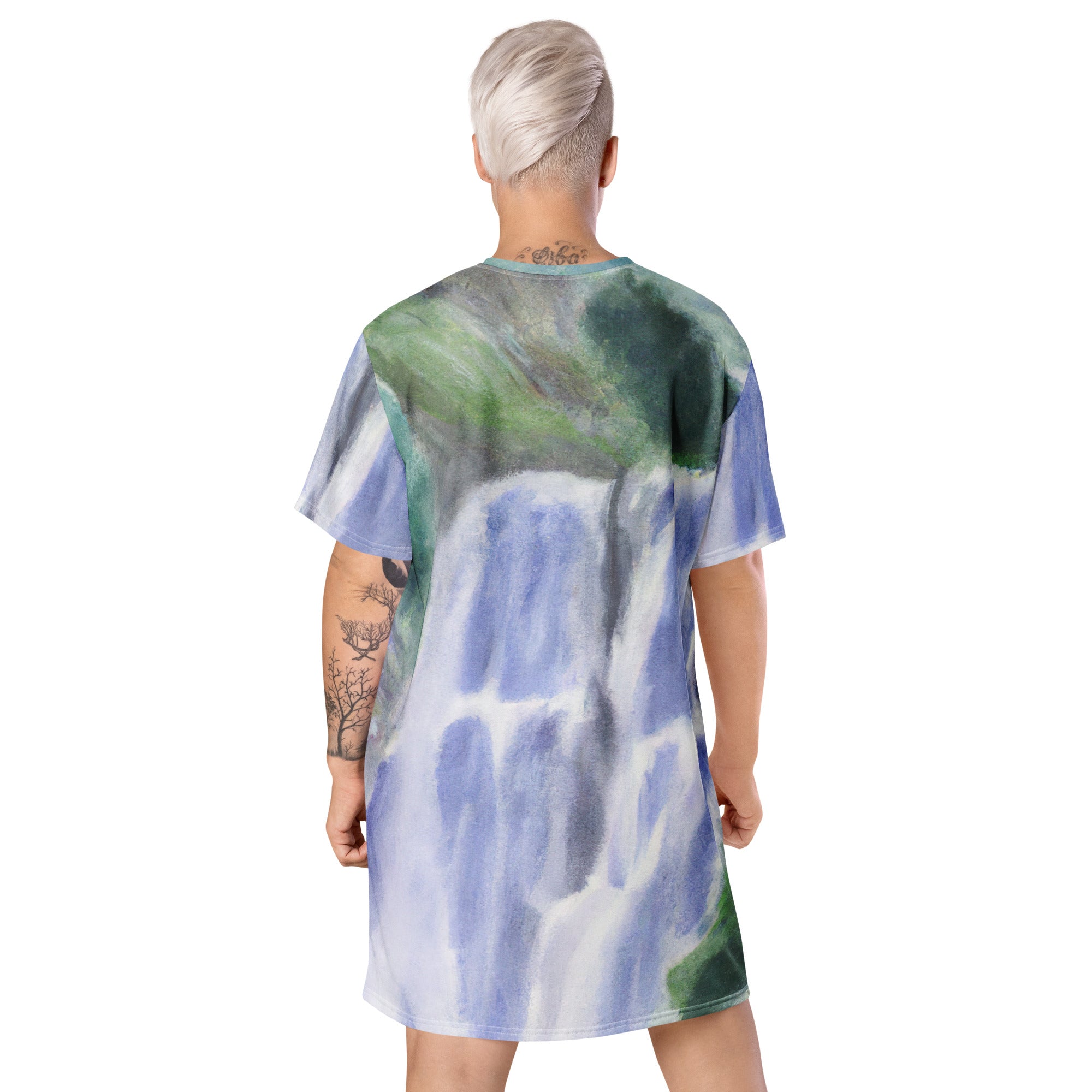 Womens Graphic T-shirt Dress featuring a Purple Watercolor Waterfall Green landscape print, showcasing a comfortable oversized fit.