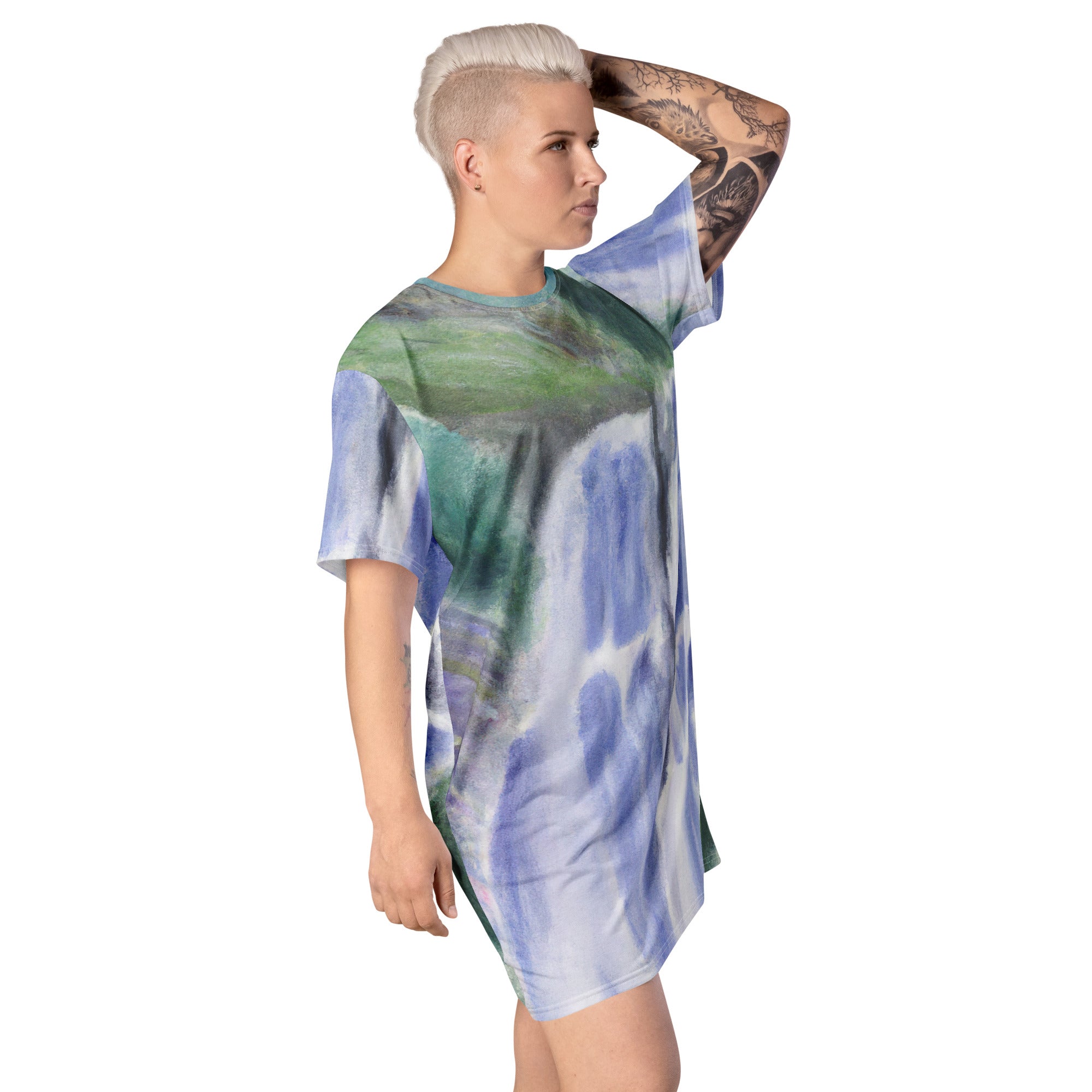 Womens Graphic T-shirt Dress featuring a Purple Watercolor Waterfall Green landscape print, showcasing a comfortable oversized fit.