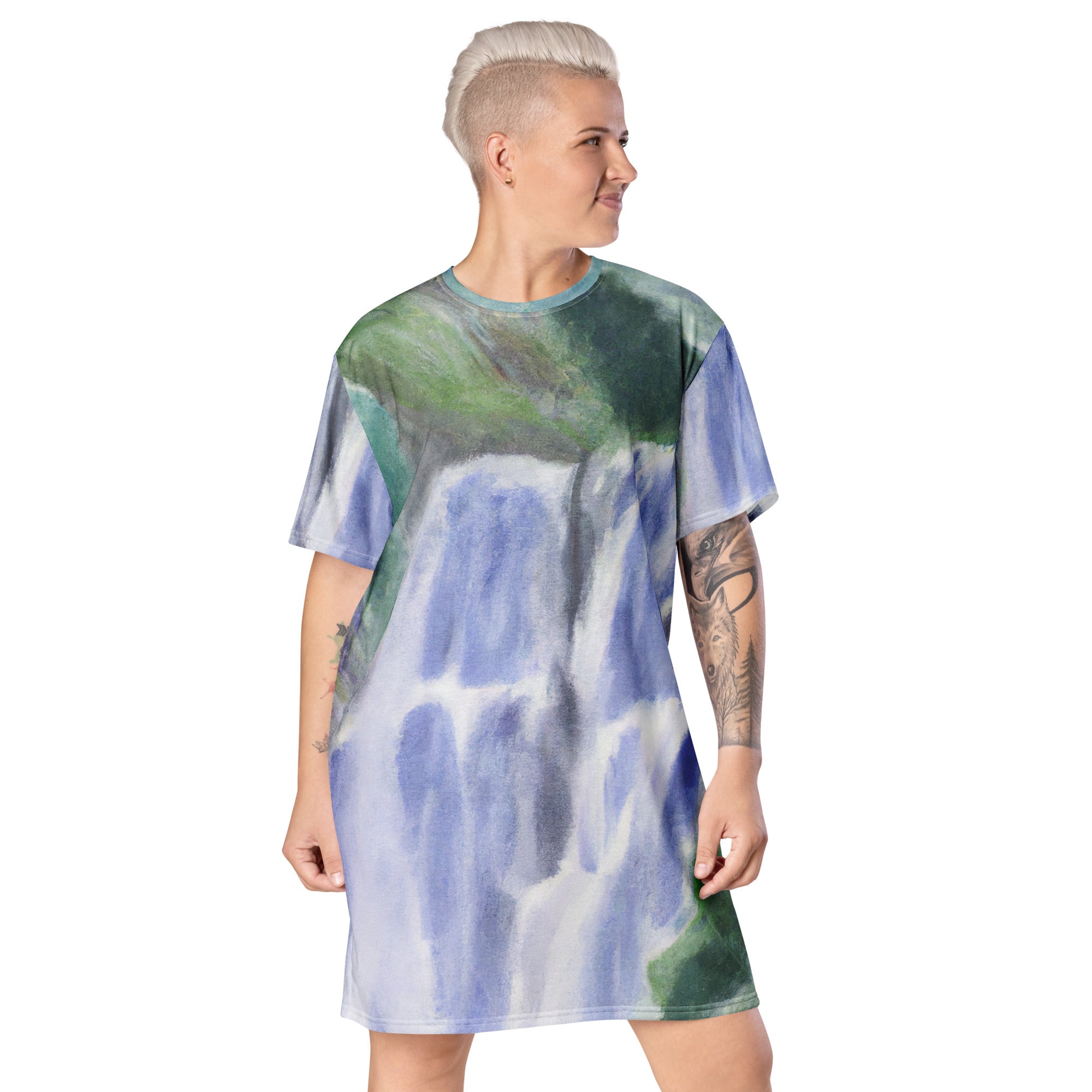 Womens Graphic T-shirt Dress featuring a Purple Watercolor Waterfall Green landscape print, showcasing a comfortable oversized fit.