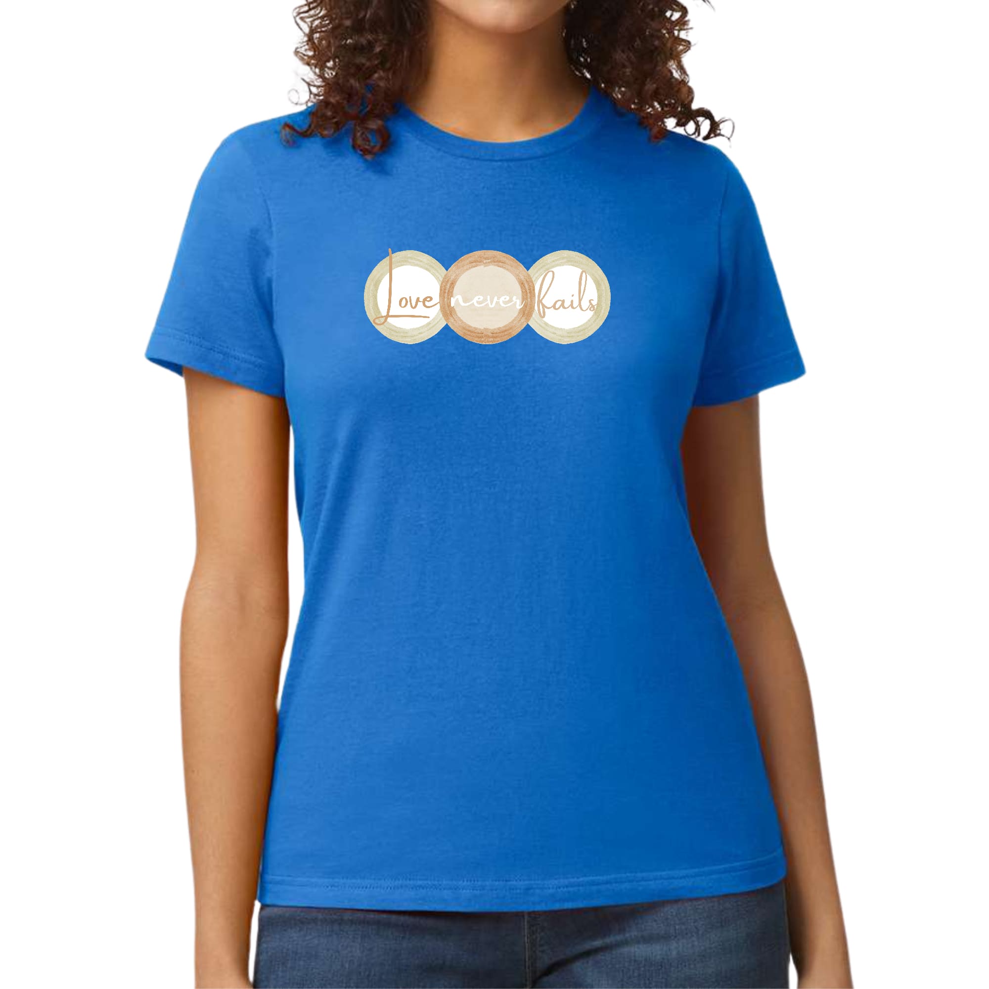 Womens Graphic T-shirt in pastel brown, beige, and green with 'Love Never Fails' design, showcasing a comfortable fit and stylish look.