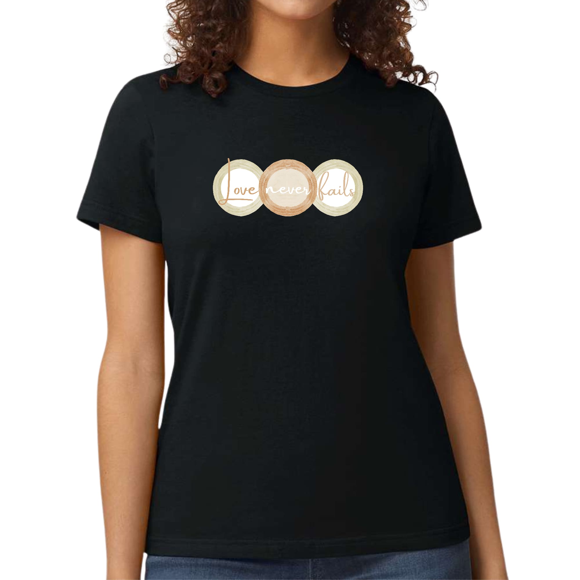 Womens Graphic T-shirt in pastel brown, beige, and green with 'Love Never Fails' design, showcasing a comfortable fit and stylish look.