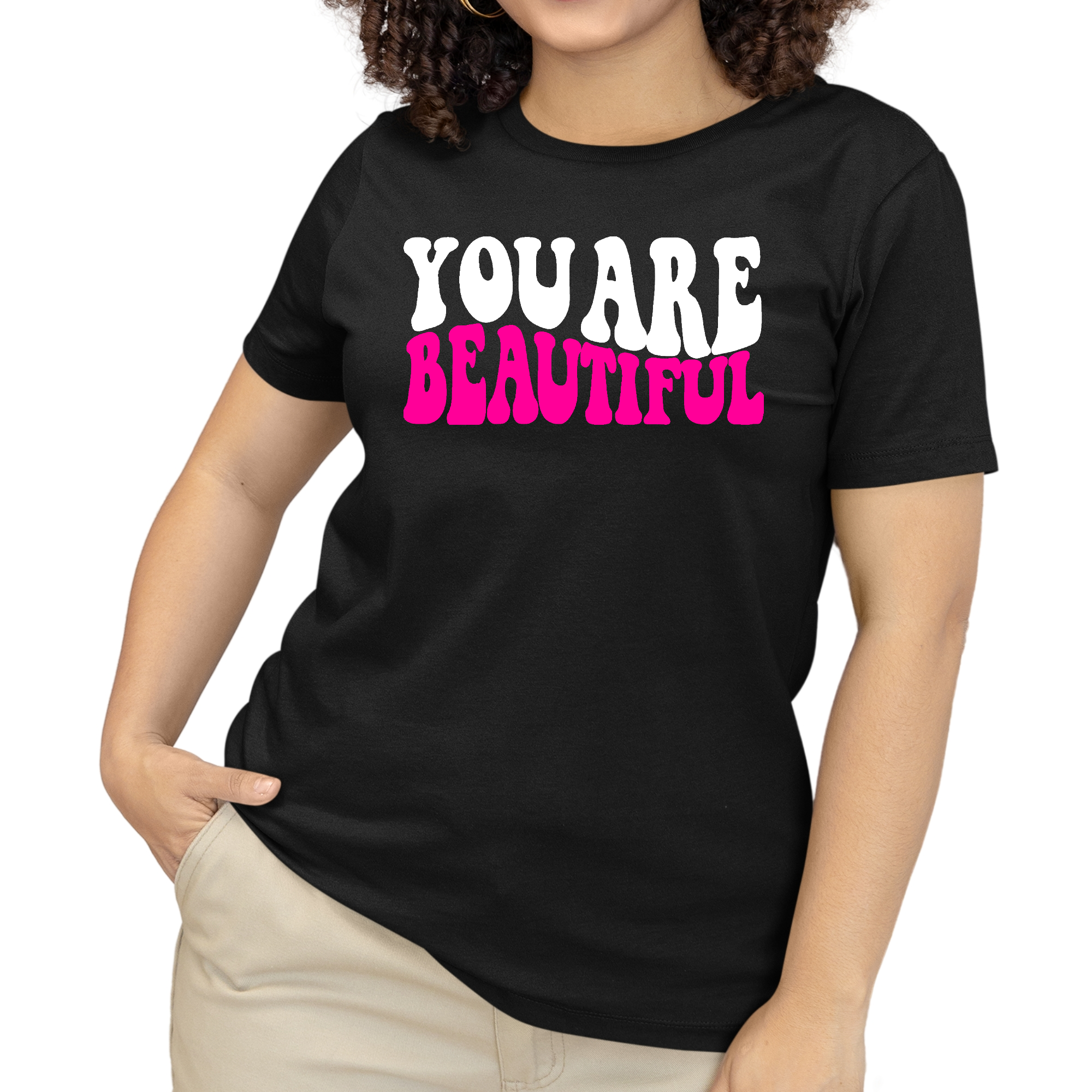 Women's Graphic T-shirt in pink and white with 'You Are Beautiful' affirmation, showcasing a retro wavy design.