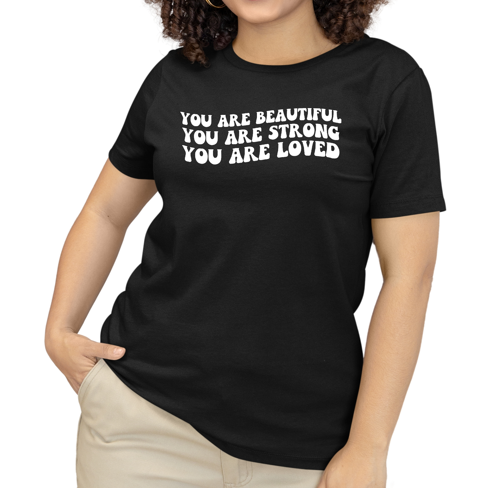 A stylish women's graphic T-shirt featuring the inspirational phrase 'You Are Beautiful Strong Loved' printed on soft preshrunk cotton fabric.