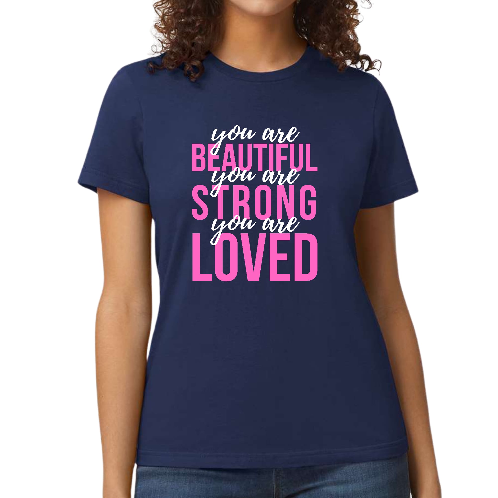 A pink and white women's graphic T-shirt with the inspirational text 'You Are Beautiful Strong Loved' printed on it, showcasing a comfortable and stylish design.