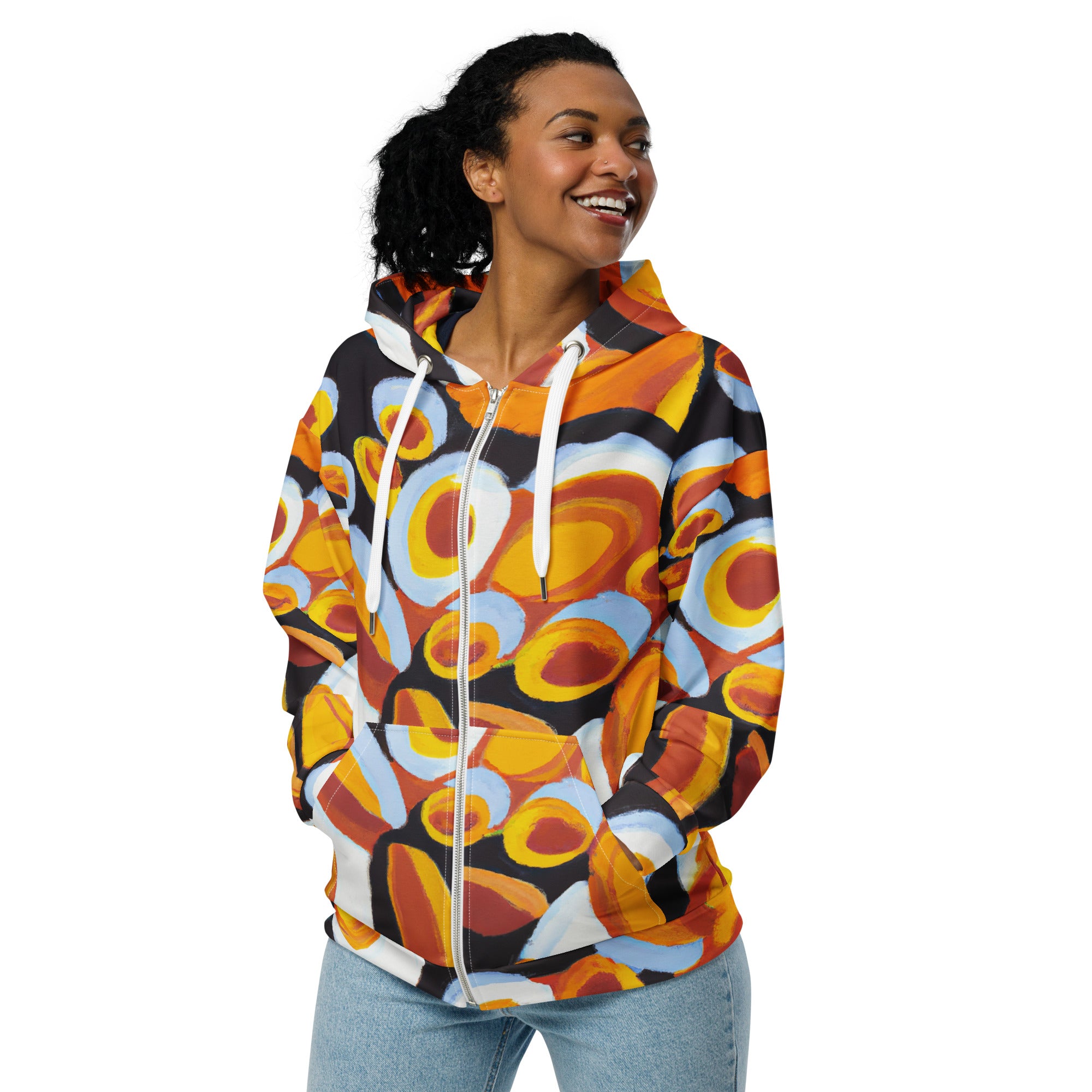 Women's Graphic Zip Hoodie featuring an orange, black, and white geometric print pattern, showcasing a relaxed fit and double-lined hood.