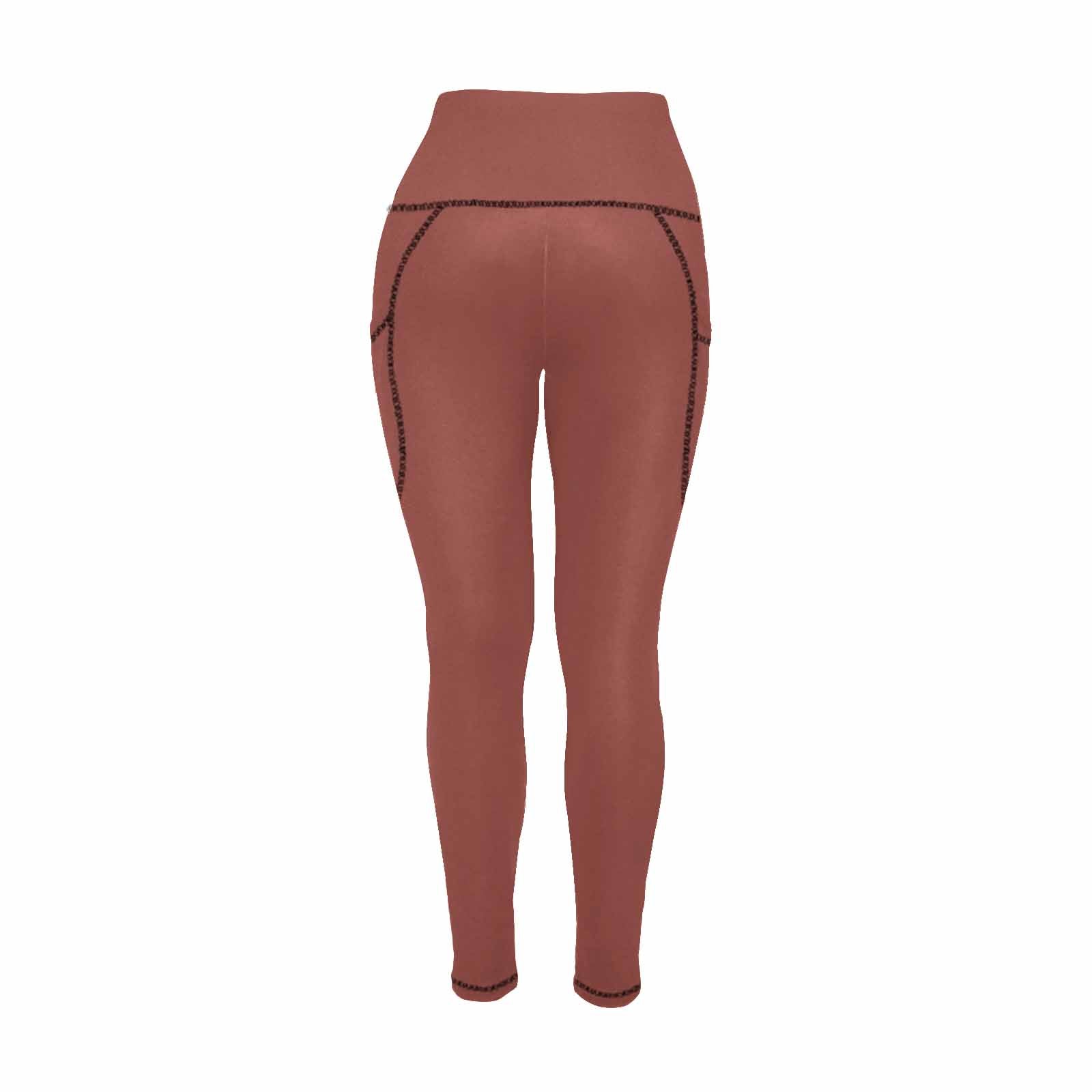 A pair of women's cognac red leggings with side pockets, showcasing a stylish design and lightweight fabric, perfect for fitness and casual wear.