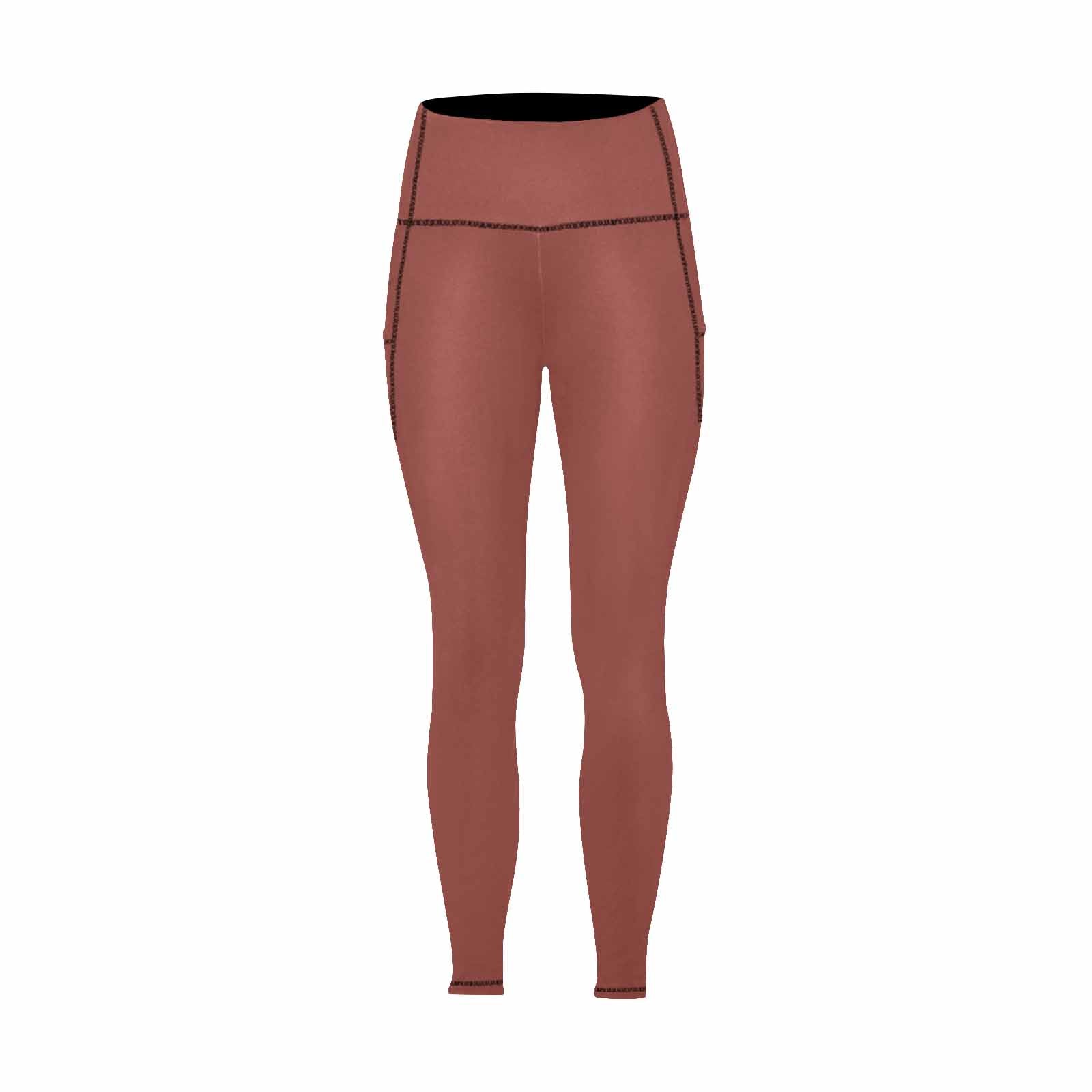 A pair of women's cognac red leggings with side pockets, showcasing a stylish design and lightweight fabric, perfect for fitness and casual wear.