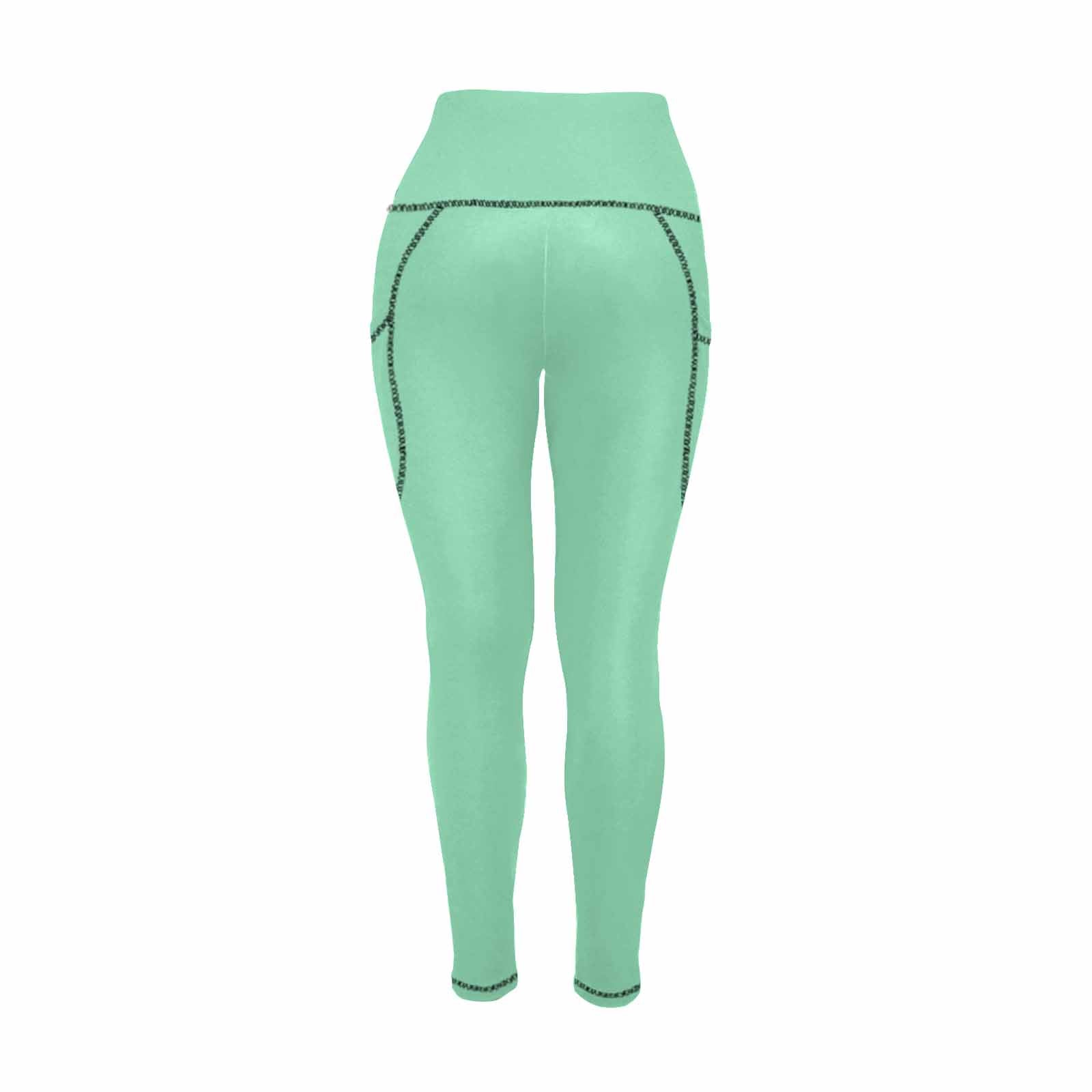 A pair of seafoam green women's leggings with pockets, showcasing a soft and lightweight fabric, perfect for fitness and casual wear.