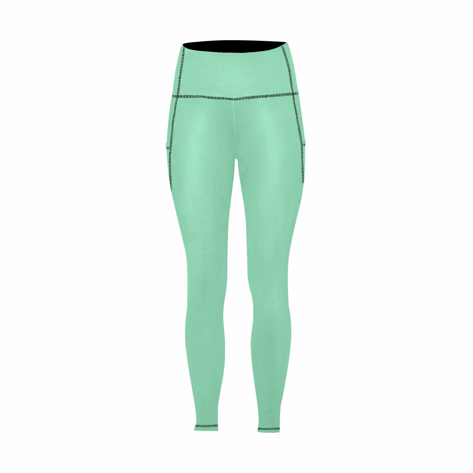 A pair of seafoam green women's leggings with pockets, showcasing a soft and lightweight fabric, perfect for fitness and casual wear.