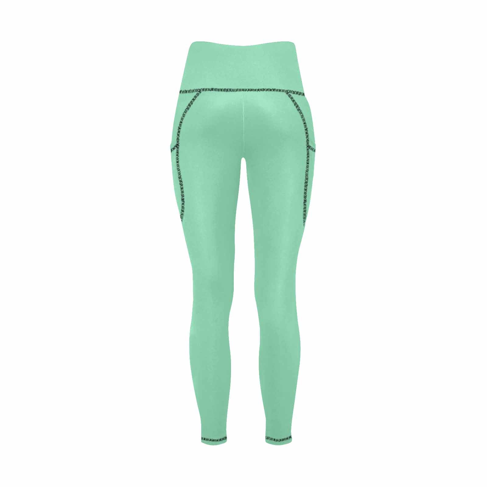 A pair of seafoam green women's leggings with pockets, showcasing a soft and lightweight fabric, perfect for fitness and casual wear.