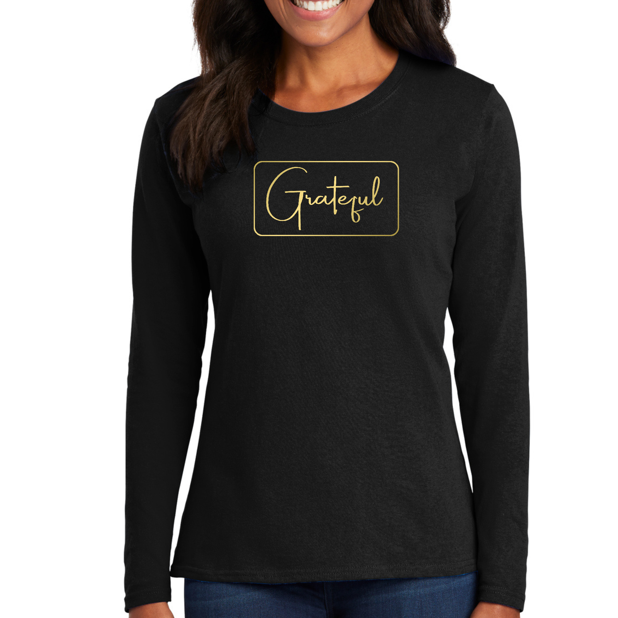 Women's long sleeve graphic t-shirt featuring a metallic gold 'Grateful' design, made from soft cotton fabric.