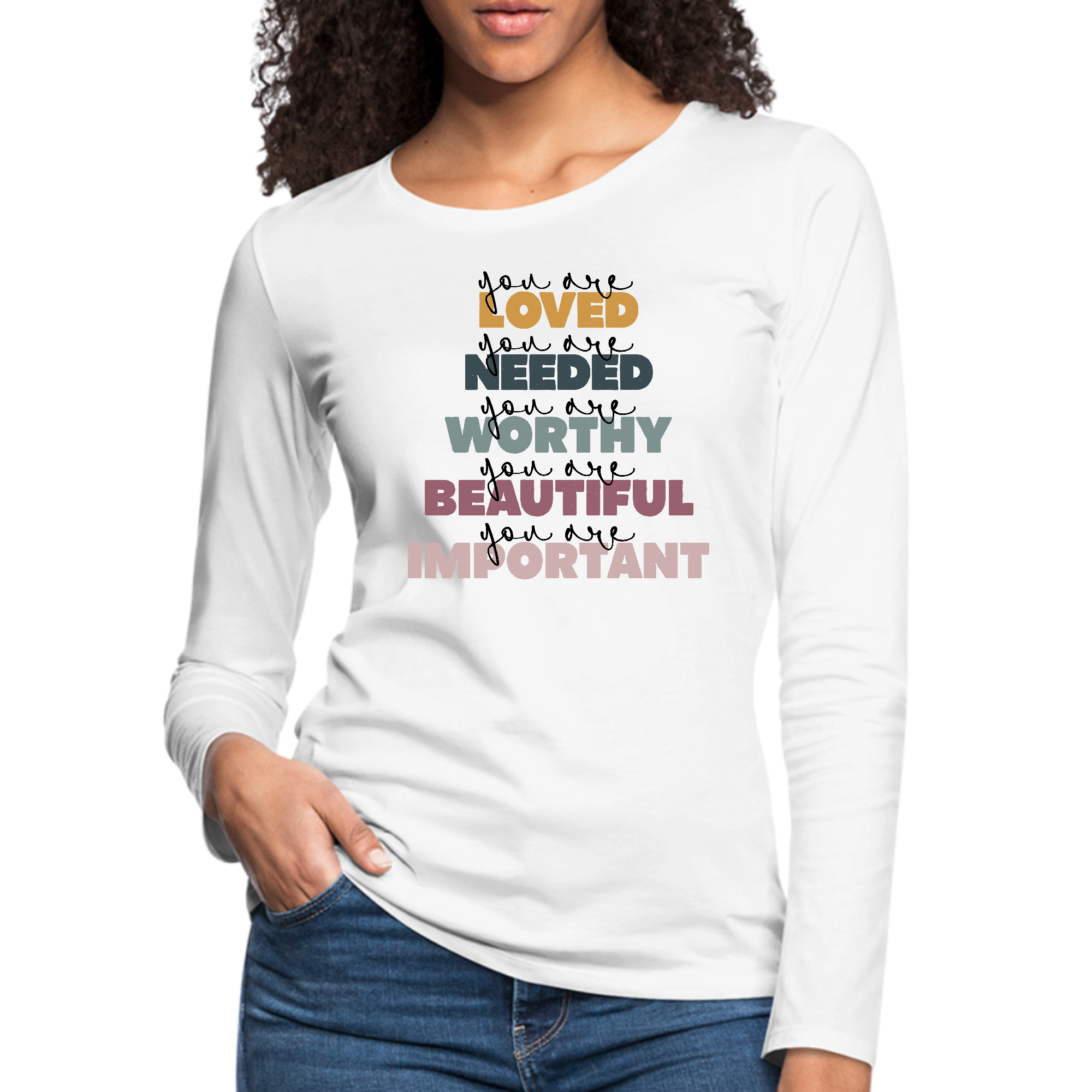 Women's long sleeve graphic t-shirt featuring 'You Are Loved' inspirational message, made from soft cotton with durable stitching.