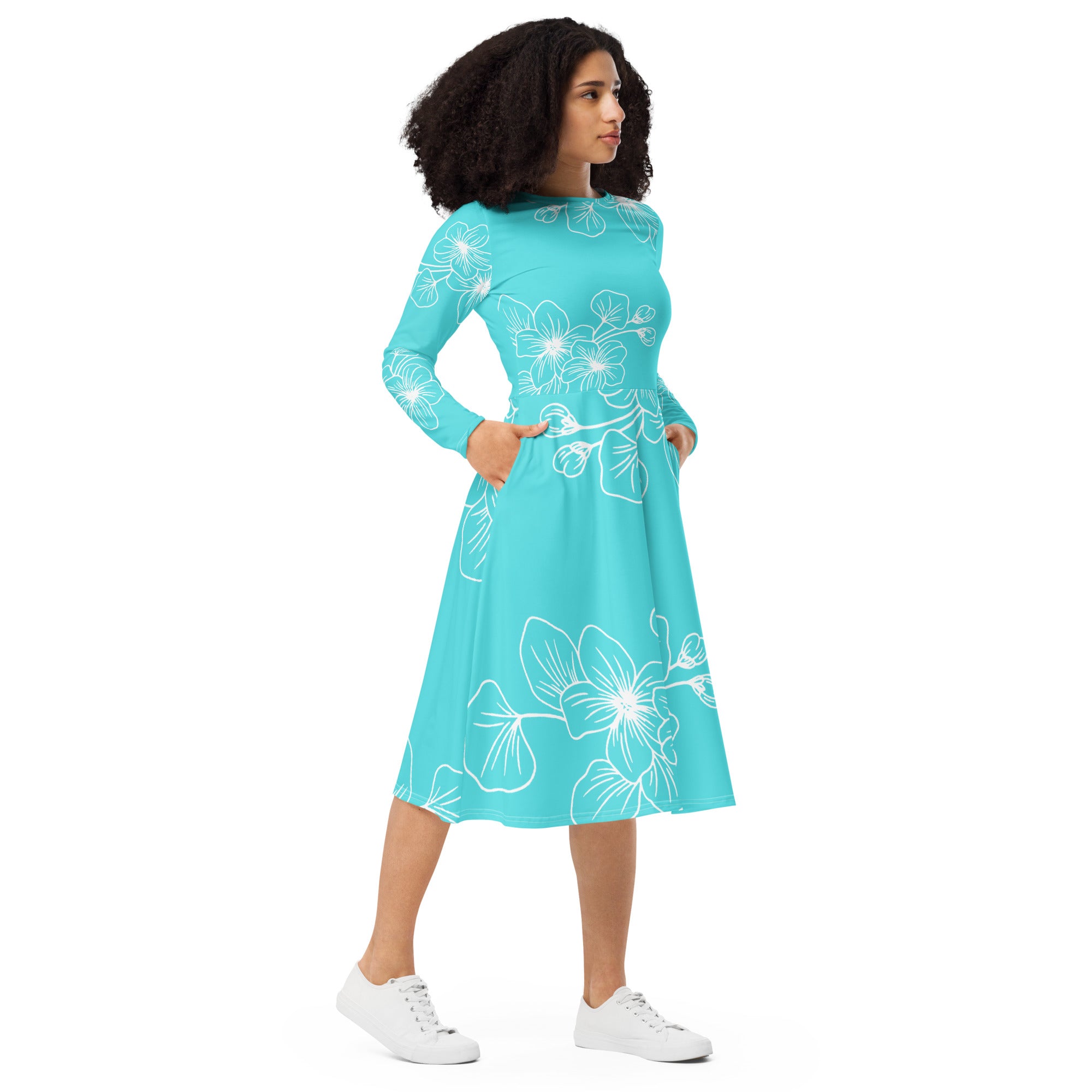 Womens Long Sleeve Midi Dress in Floral Cyan Blue, featuring a fitted waist, flared bottom, and side pockets.