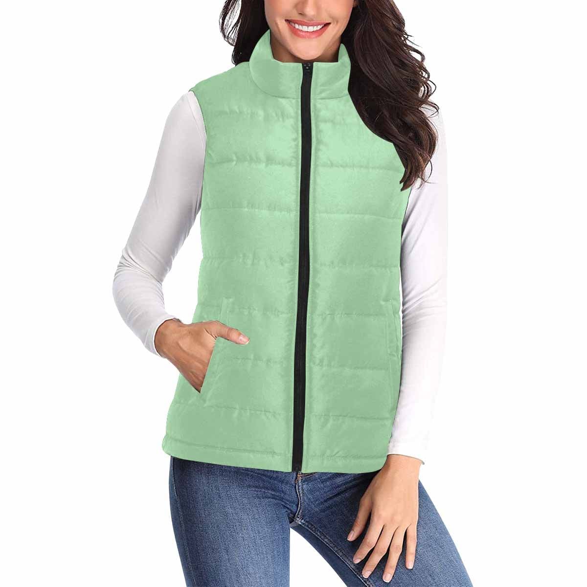 Womens Puffer Vest Jacket in Celadon Green, showcasing a stylish quilted design with zipper closure and large pockets.
