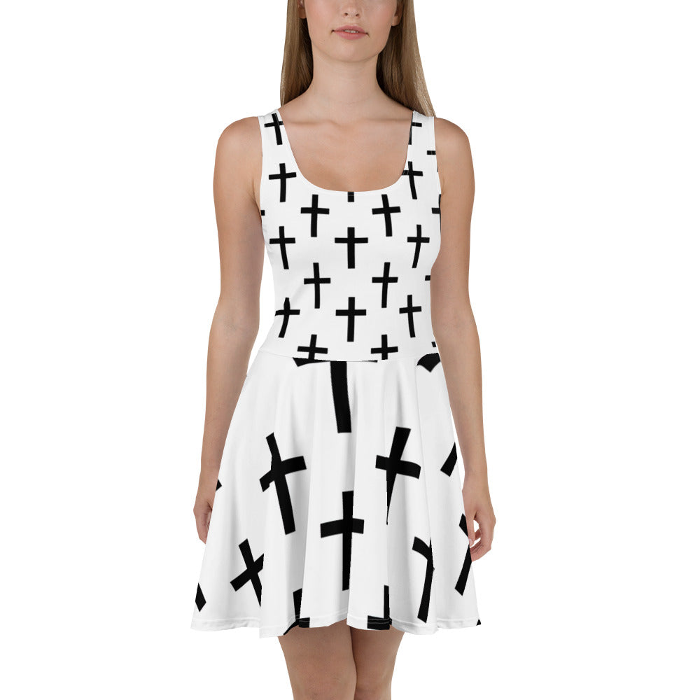 Women's skater dress featuring a stylish white and black cross print, showcasing a flattering A-line silhouette and sleeveless design.