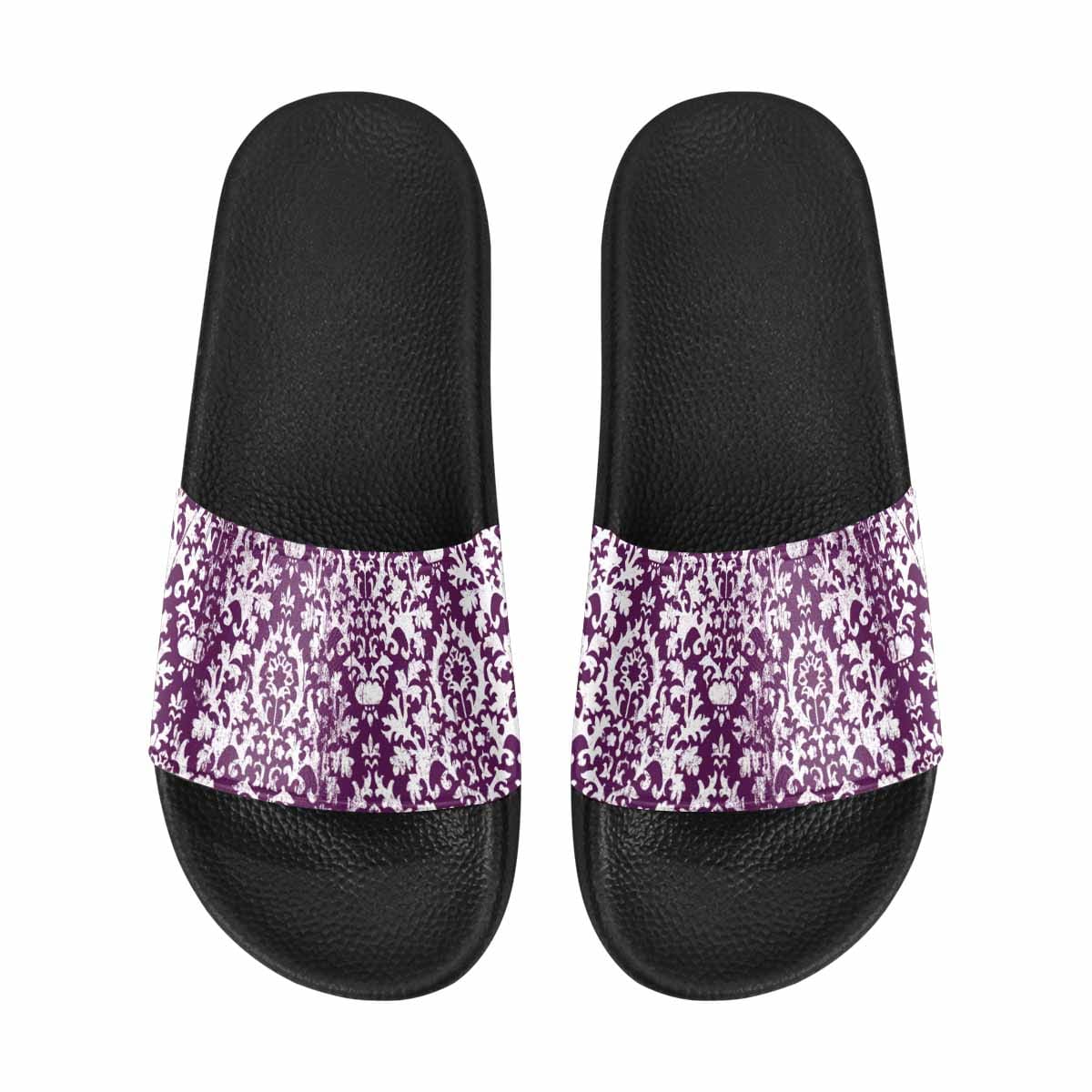 A pair of stylish women's slide sandals featuring soft PVC straps and a durable sole, perfect for casual wear.