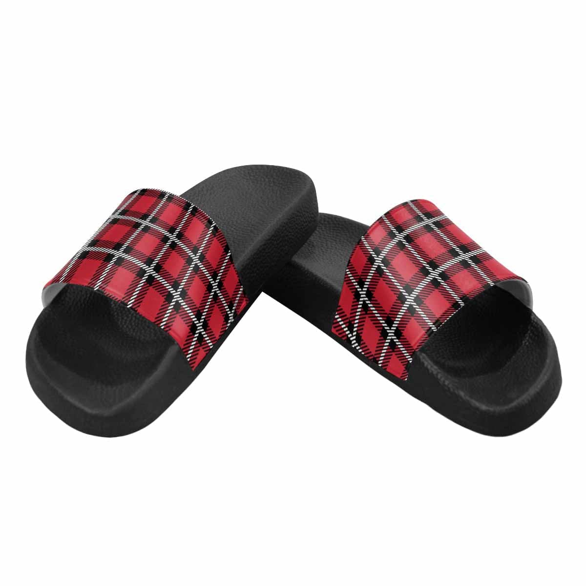 A pair of women's slide sandals featuring a buffalo plaid red design, showcasing soft PVC straps and a durable sole.