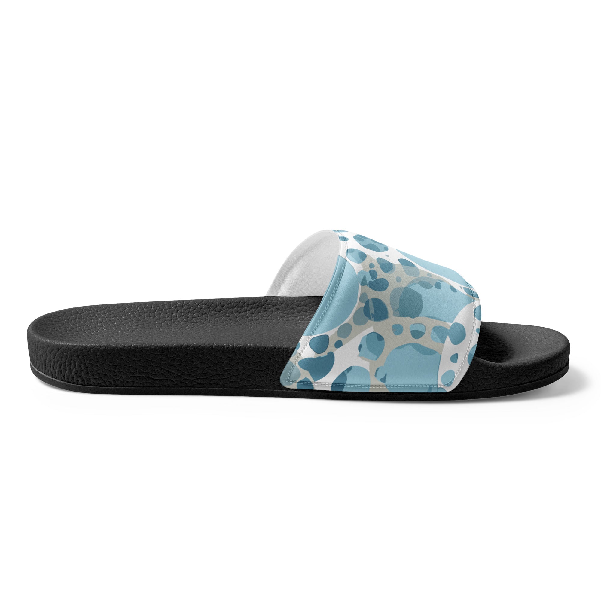 Stylish women's slides featuring a blue and white circular spotted illustration, perfect for summer activities.