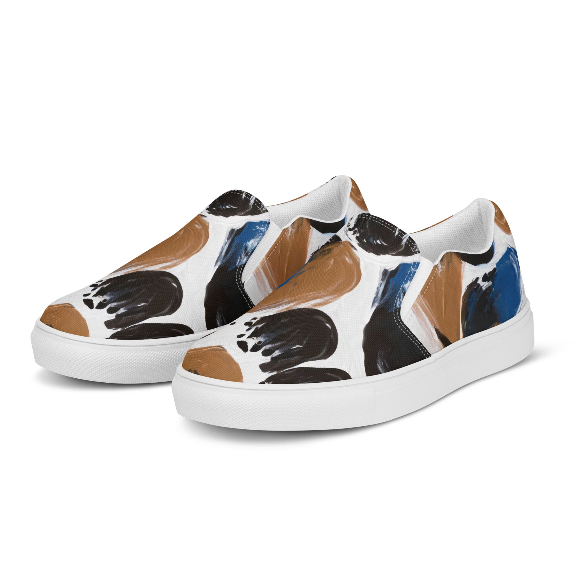 Womens slip-on canvas shoes featuring a blue and brown spotted pattern, designed for comfort and style.