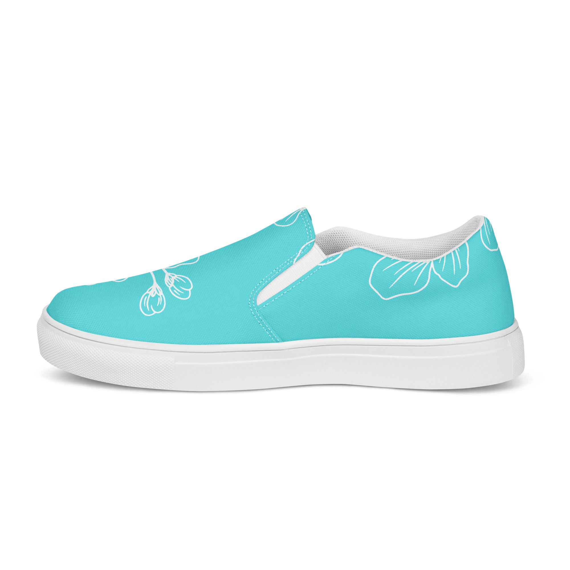 Womens Slip-on Canvas Shoes in Floral Cyan Blue, showcasing a stylish design with elastic side goring and a durable rubber sole.