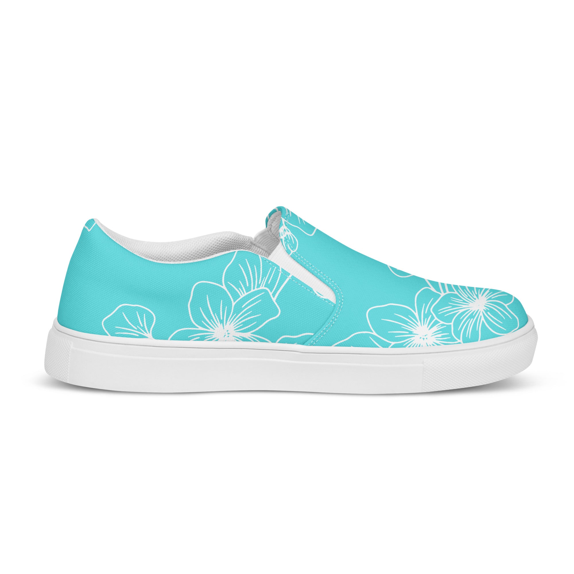Womens Slip-on Canvas Shoes in Floral Cyan Blue, showcasing a stylish design with elastic side goring and a durable rubber sole.
