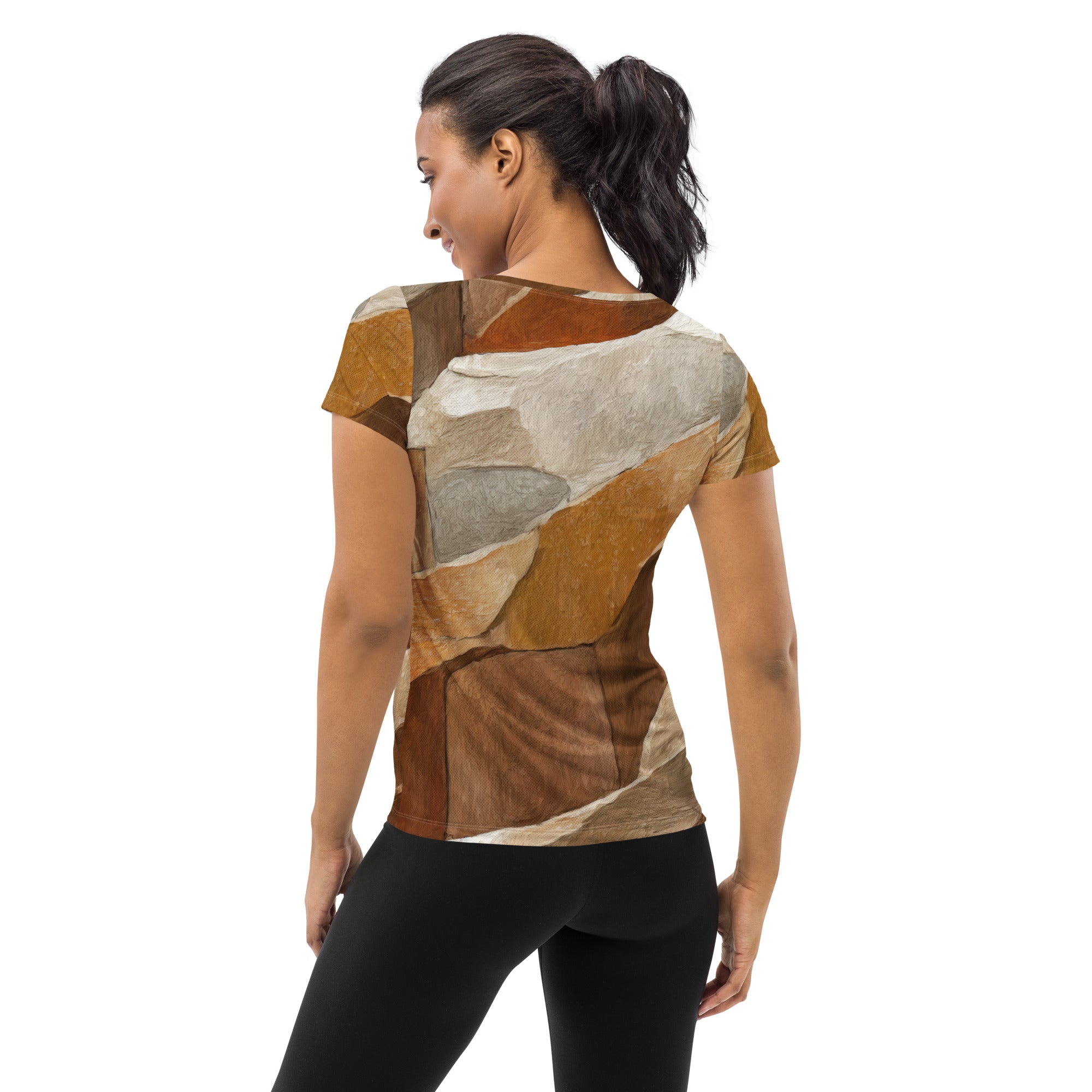 Women's Stretch Fit Athletic Sports T-shirt in Abstract Stone Print, showcasing a stylish design and comfortable fit for workouts.
